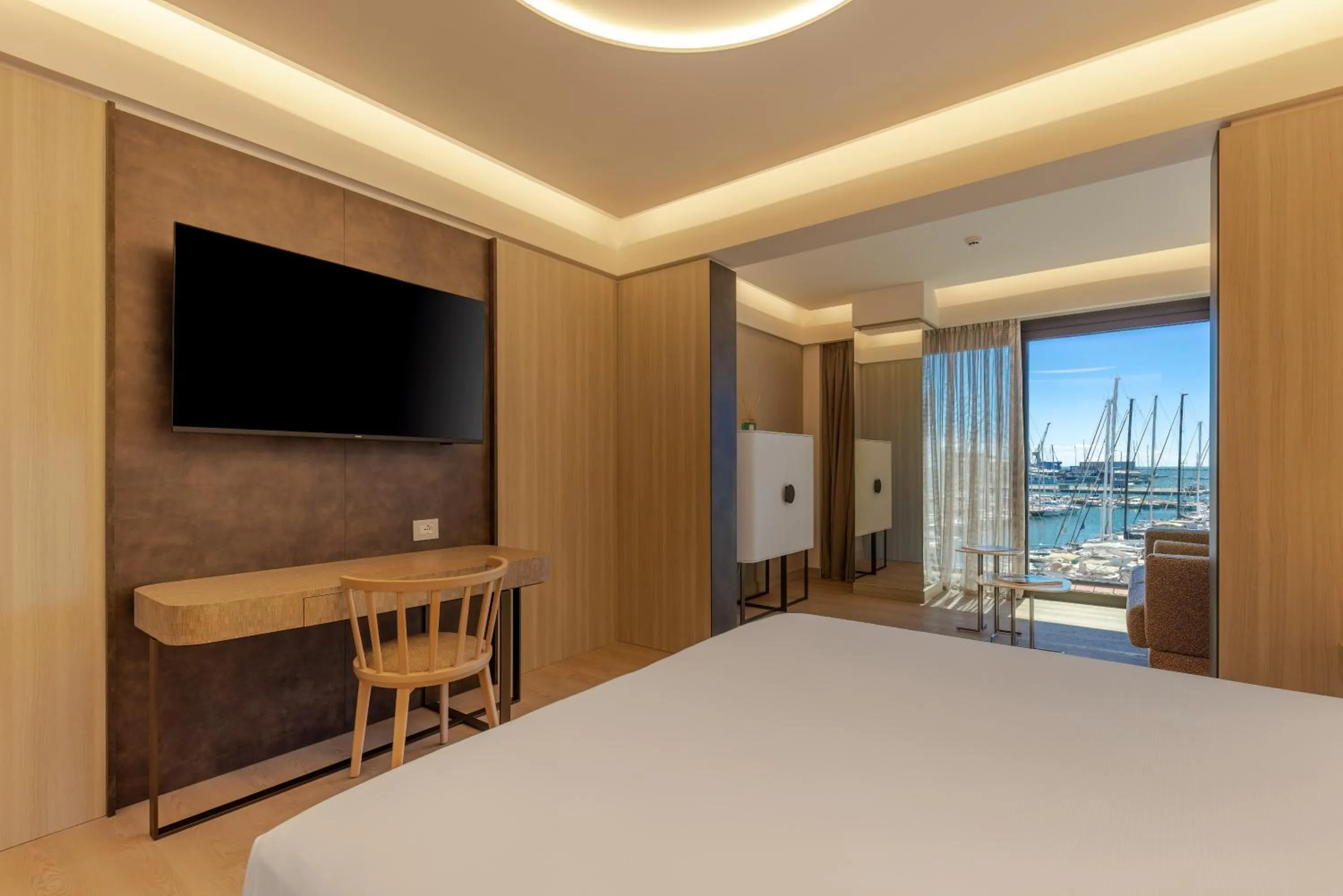 Bed in Porto Lotti Suite Hotel