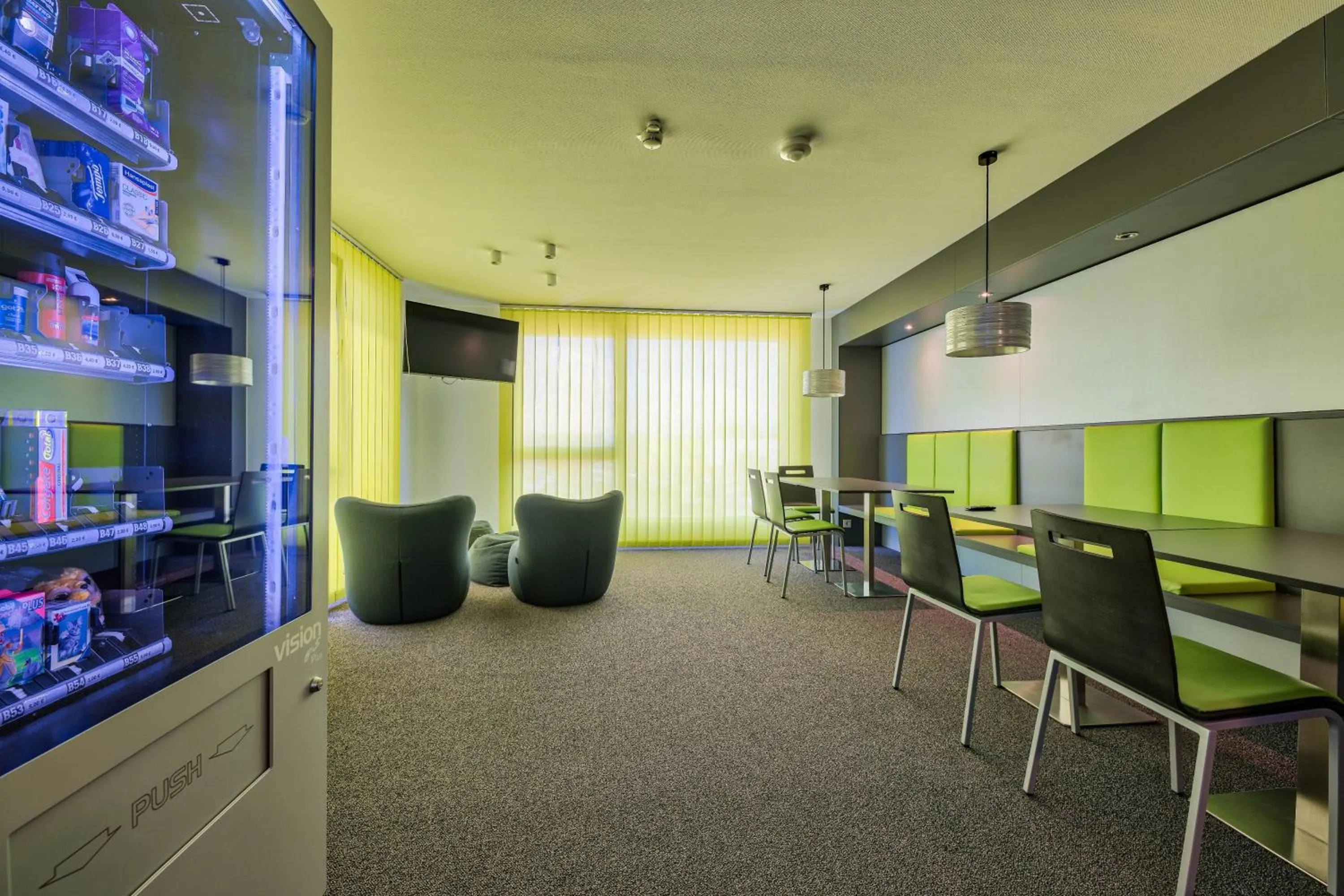 Communal lounge/ TV room in Economy-Hotel