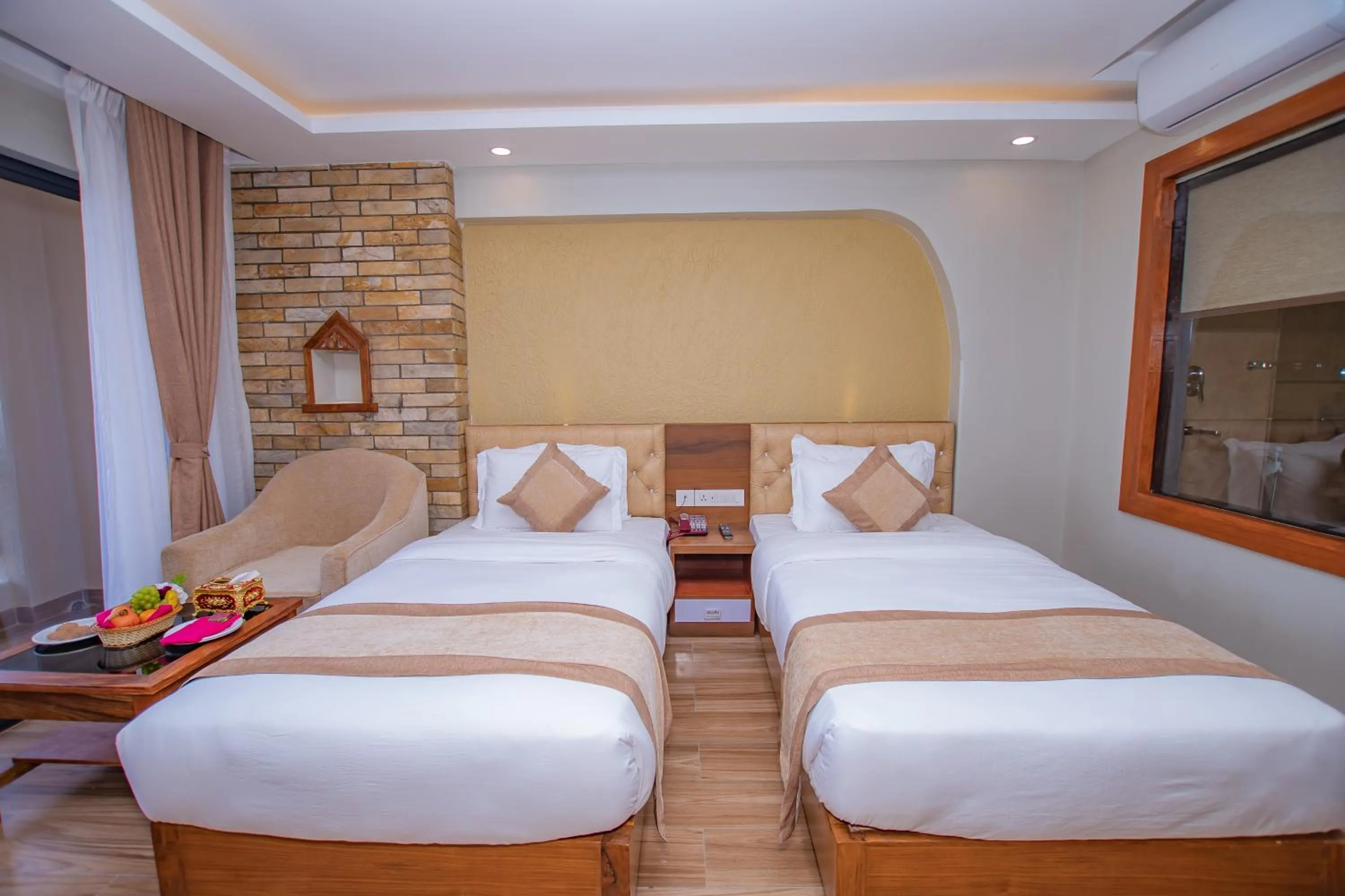 Bed in Hotel Pokhara Village & SPA