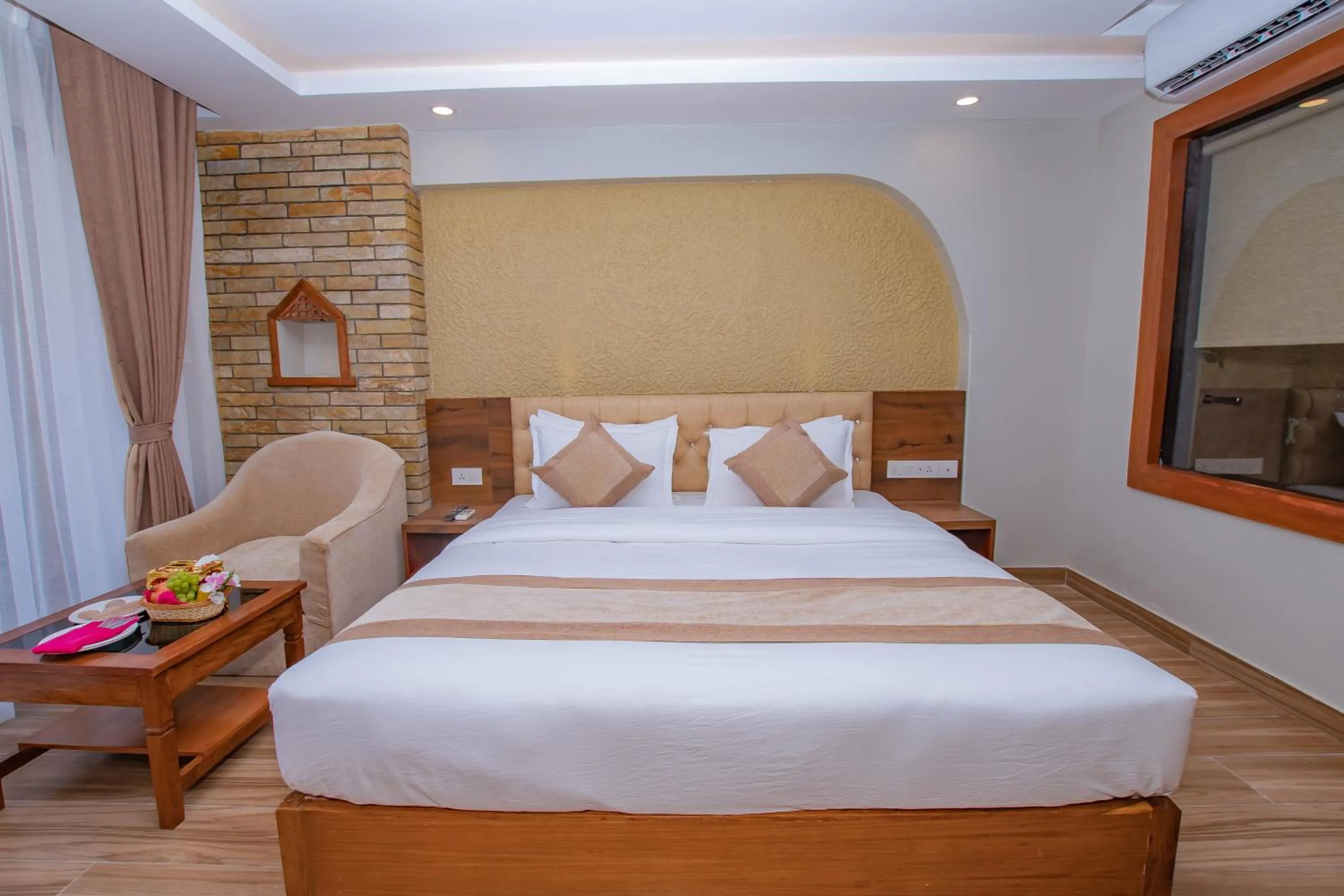 Bed in Hotel Pokhara Village & SPA