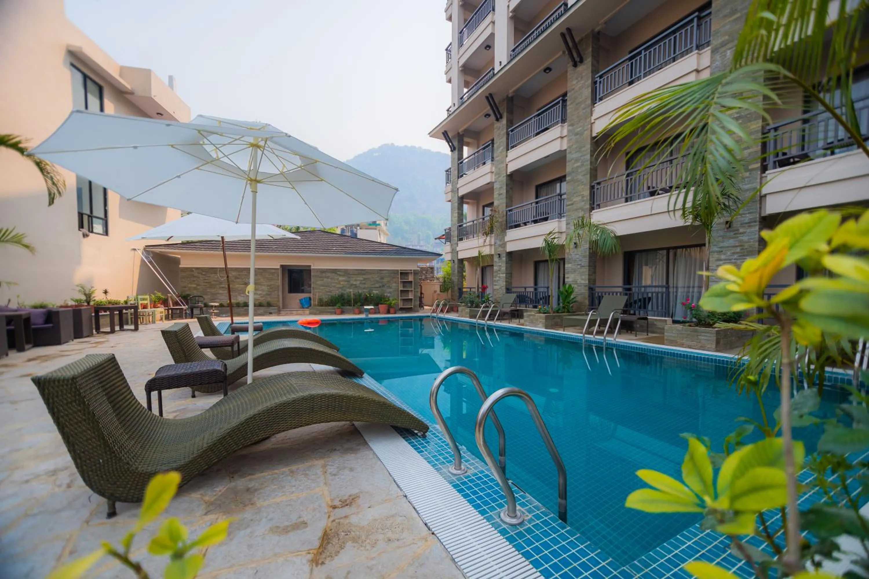Swimming pool in Hotel Pokhara Village & SPA
