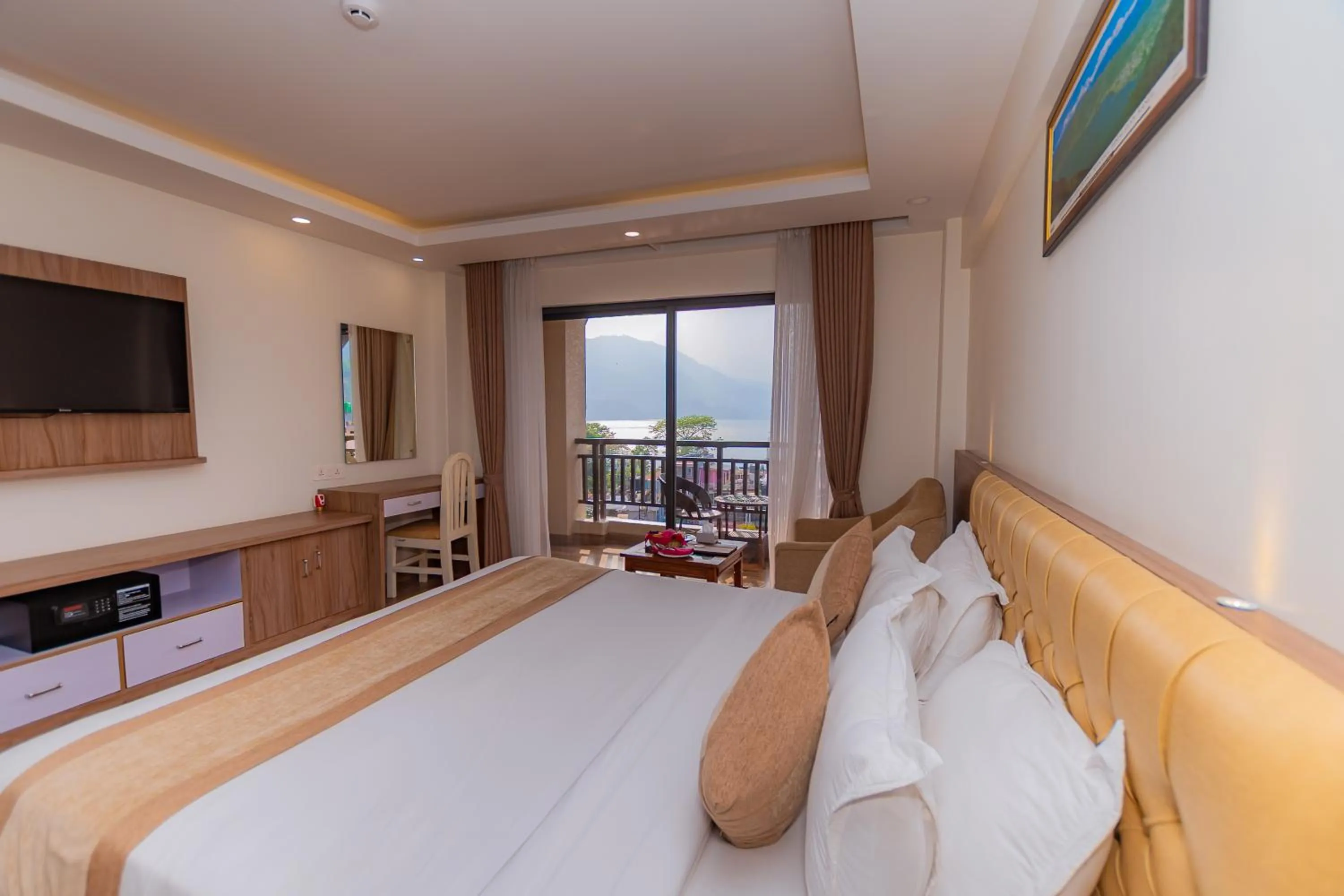 View (from property/room), Bed in Hotel Pokhara Village & SPA