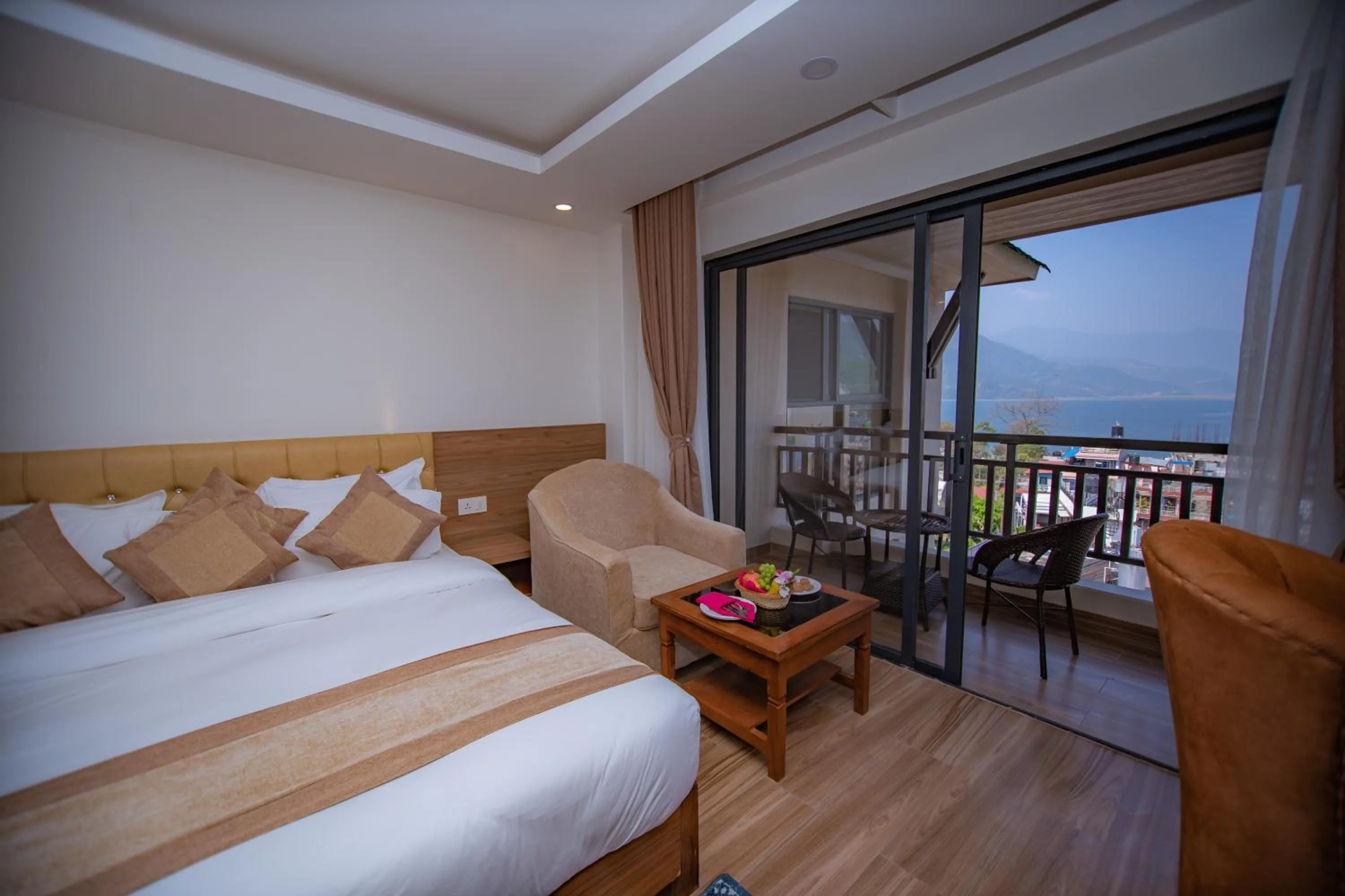 View (from property/room), Bed in Hotel Pokhara Village & SPA