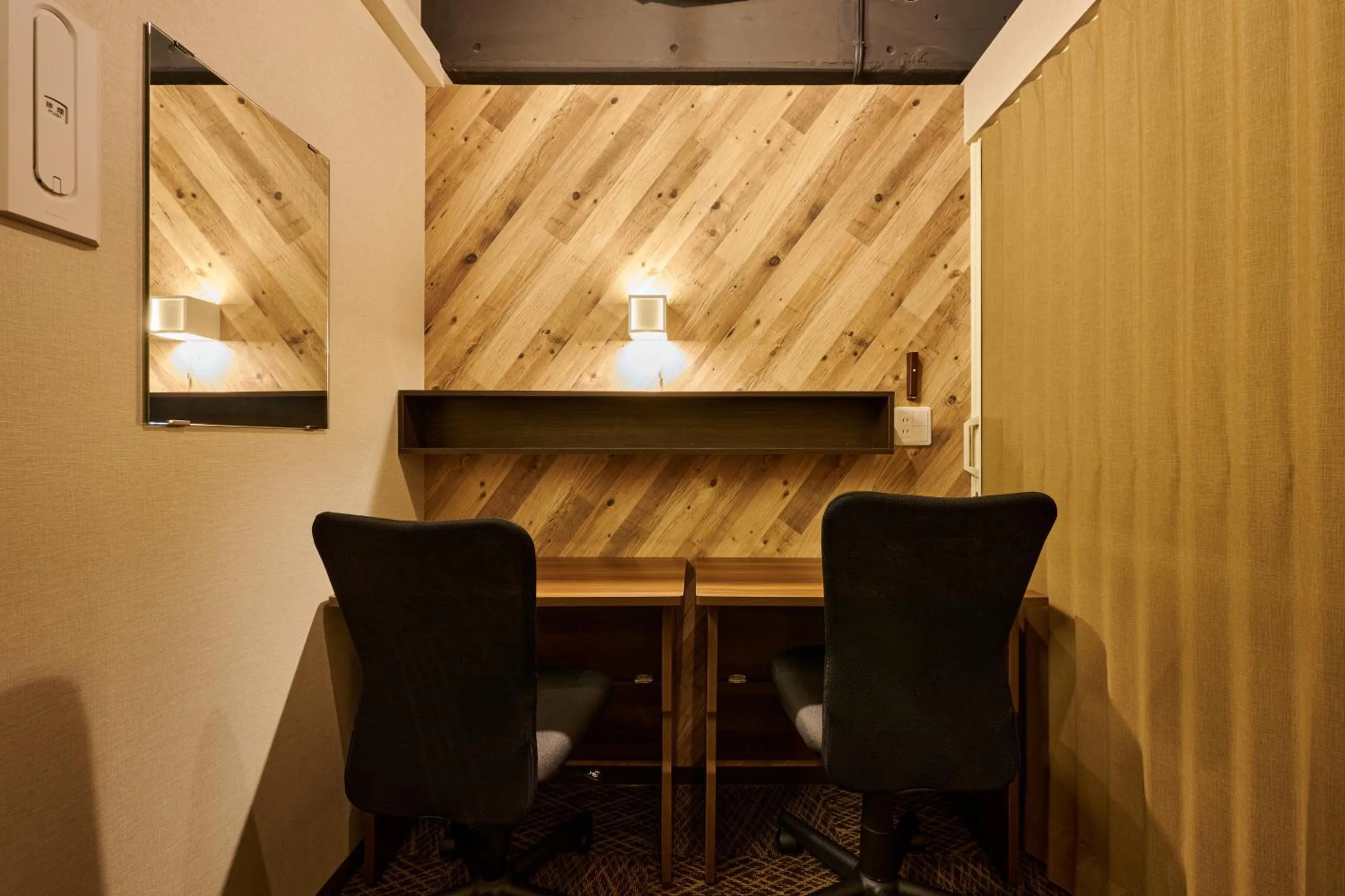 Communal lounge/ TV room in CAPSULE HOTEL CONTINUE NijojoKita