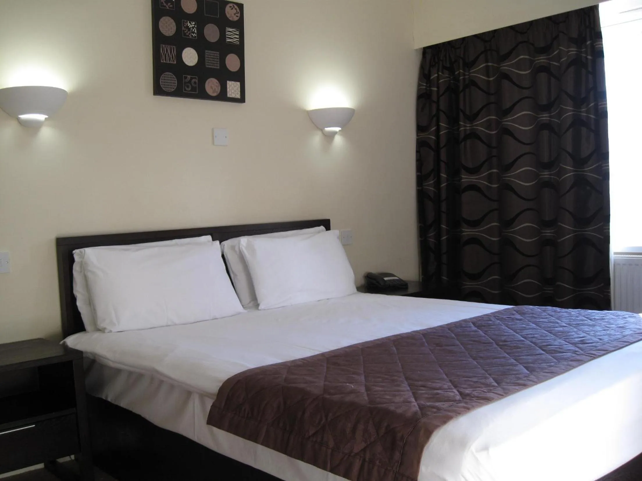 Bed in Riverside Hotel