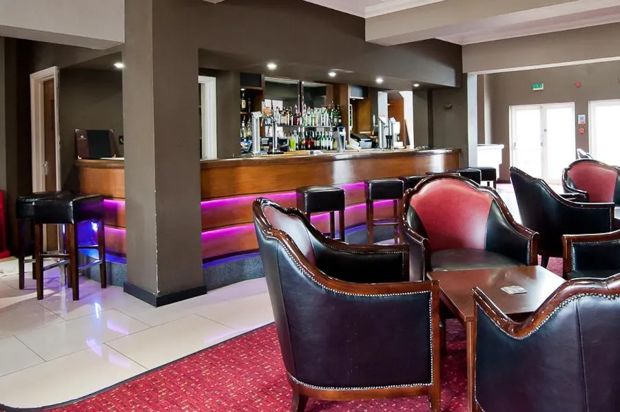 Lounge or bar in Riverside Hotel