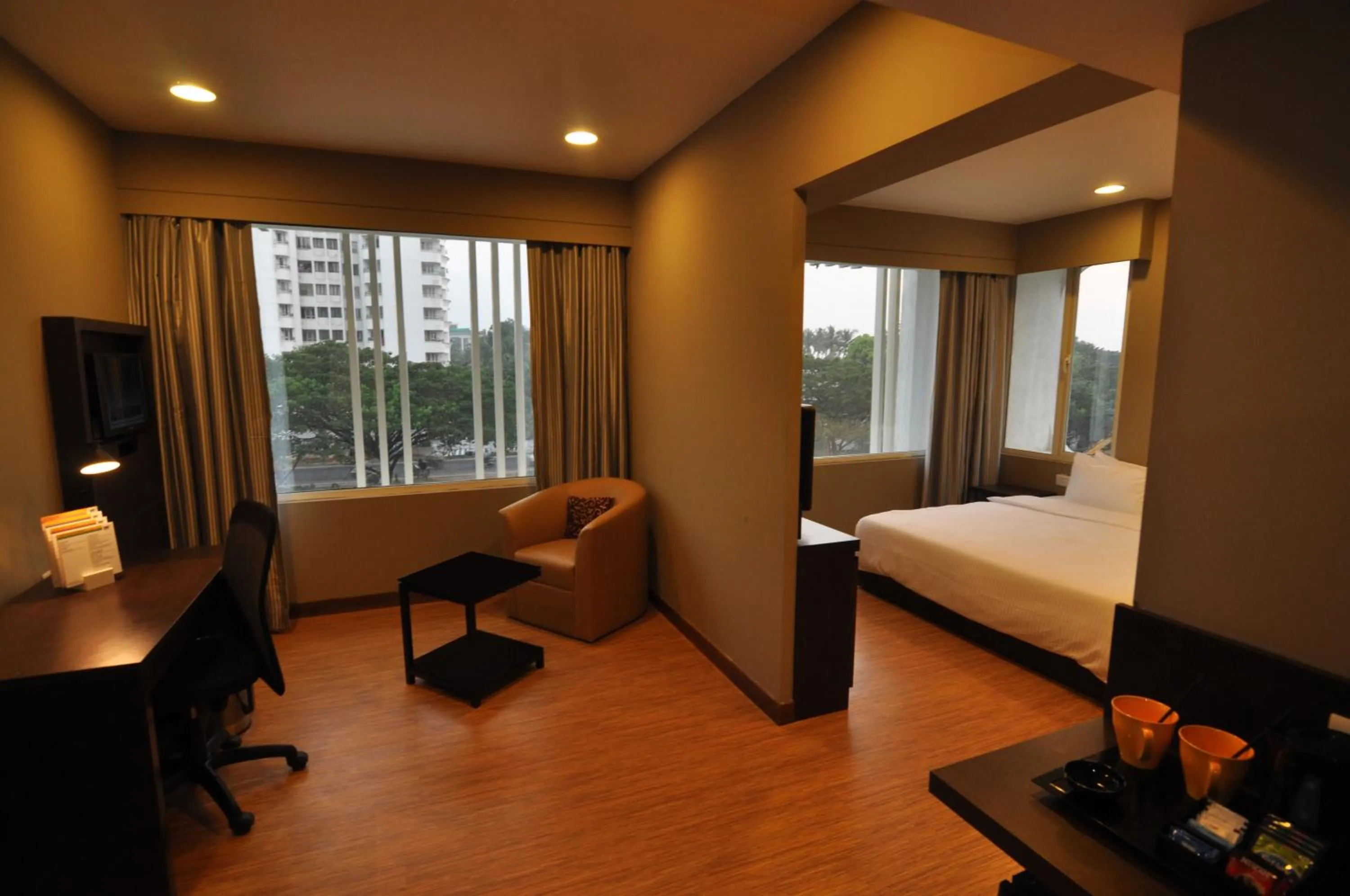 Decorative detail, Bed in Keys Select by Lemon Tree Hotels, Kochi