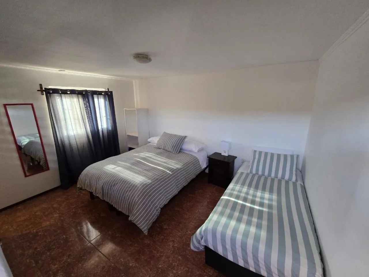 Photo of the whole room, Bed in Hostal Siete Colores