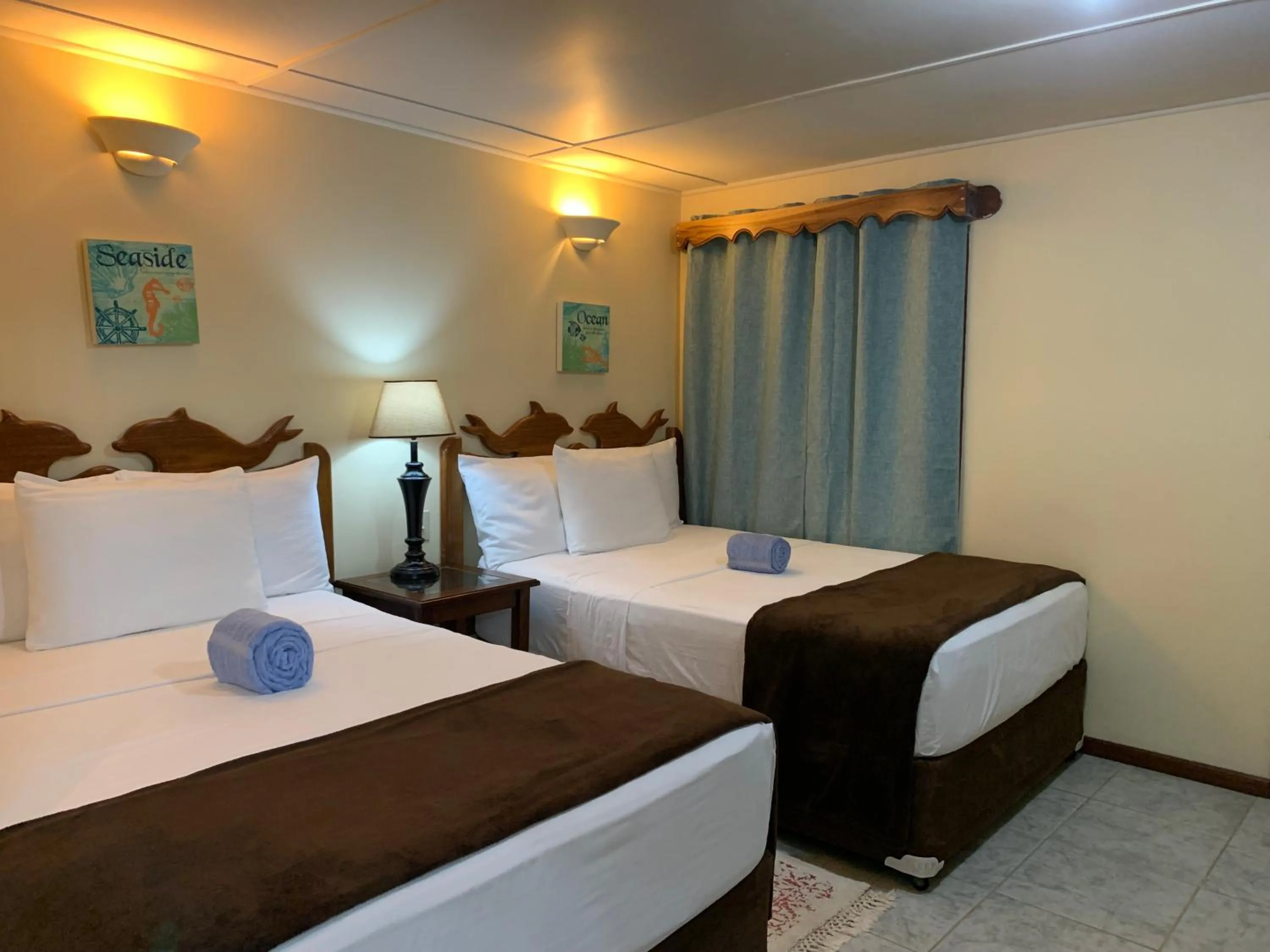 Bed in Blue Marlin Beach Resort