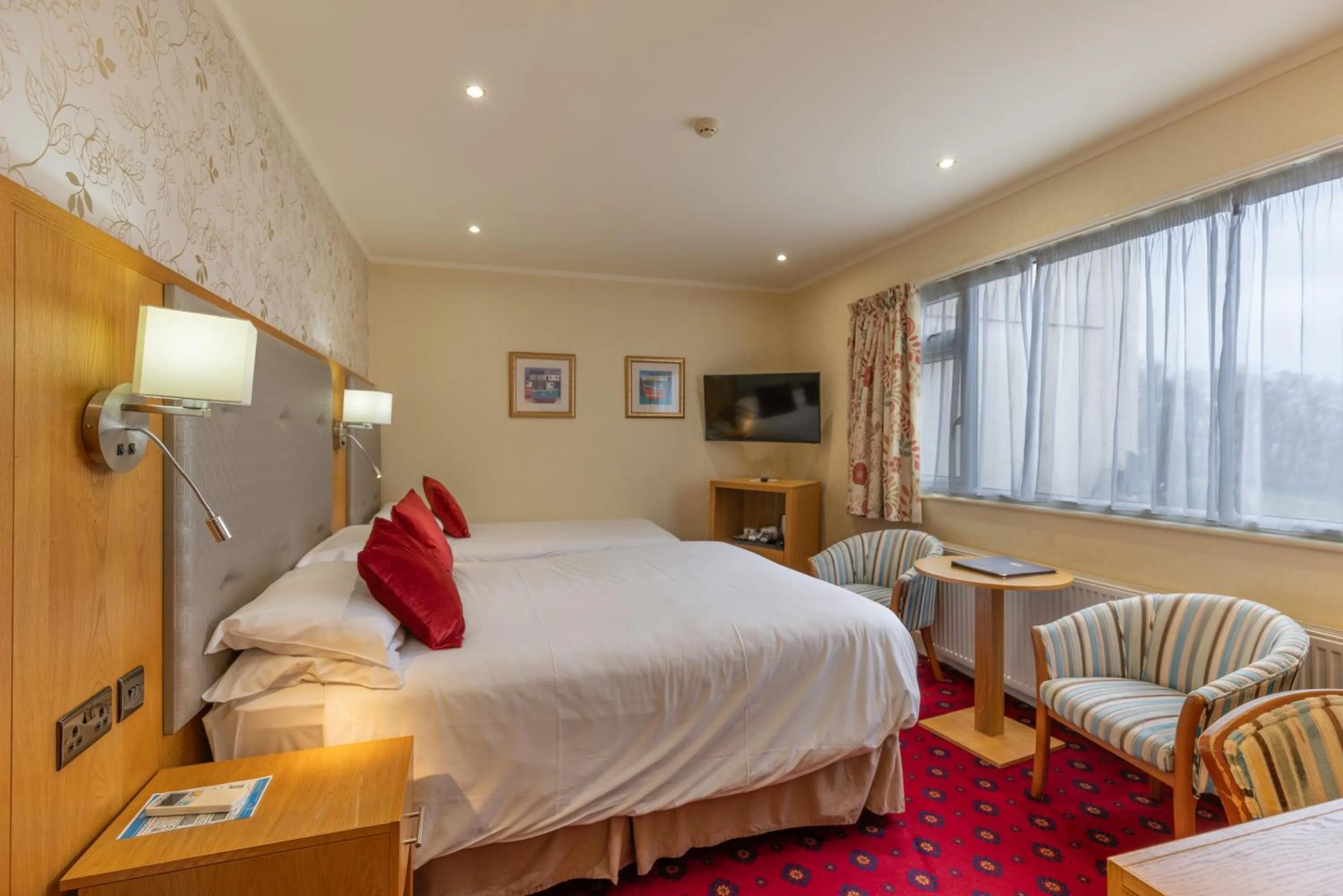 Bed in Langstone Cliff Hotel