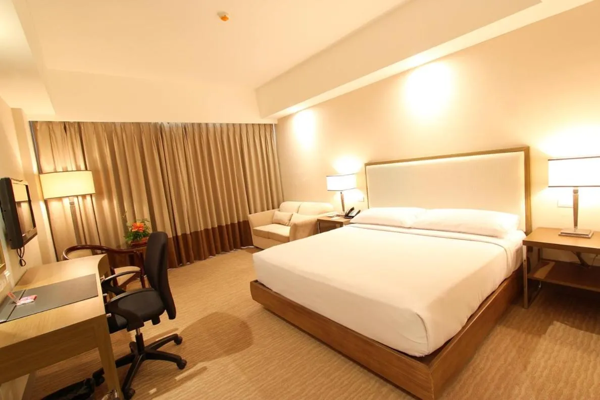 Bed in Garden Orchid Hotel & Resort Corp.