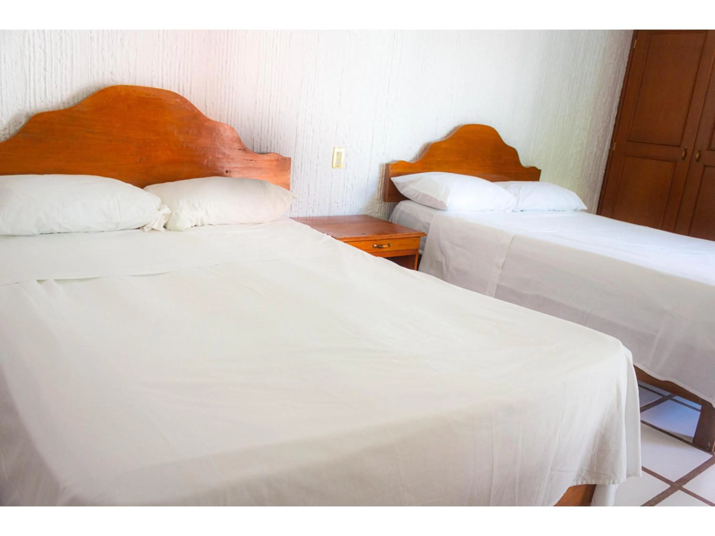 Bedroom in OYO Hotel San Felipe Inn