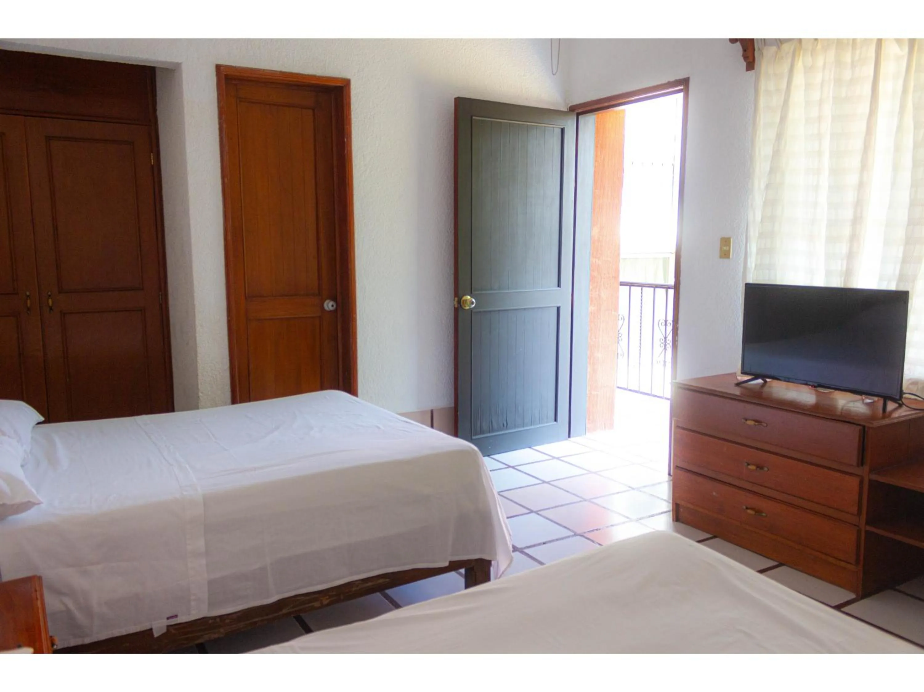 Bedroom in OYO Hotel San Felipe Inn