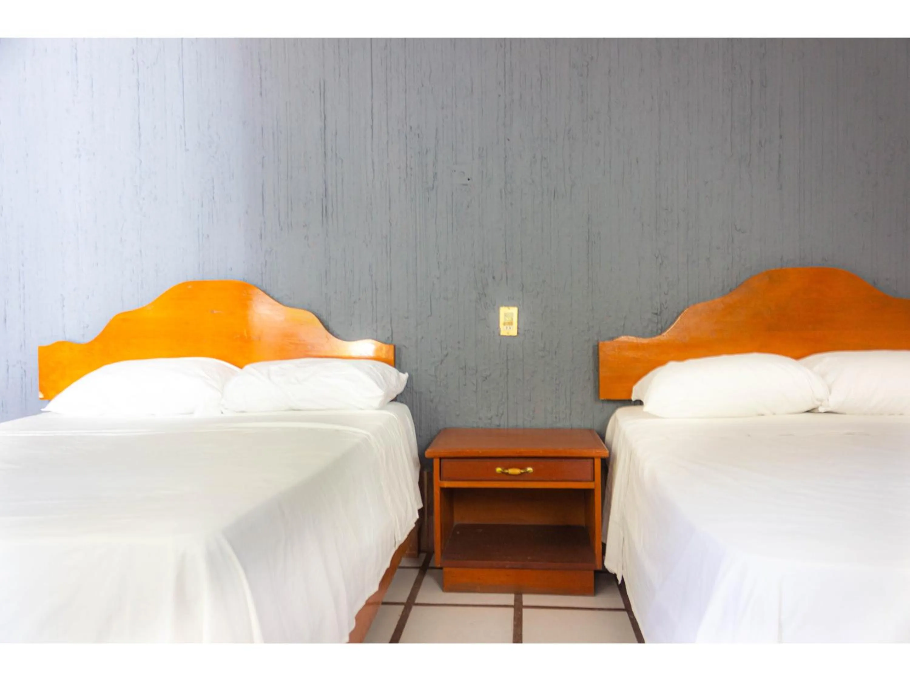 Bedroom in OYO Hotel San Felipe Inn