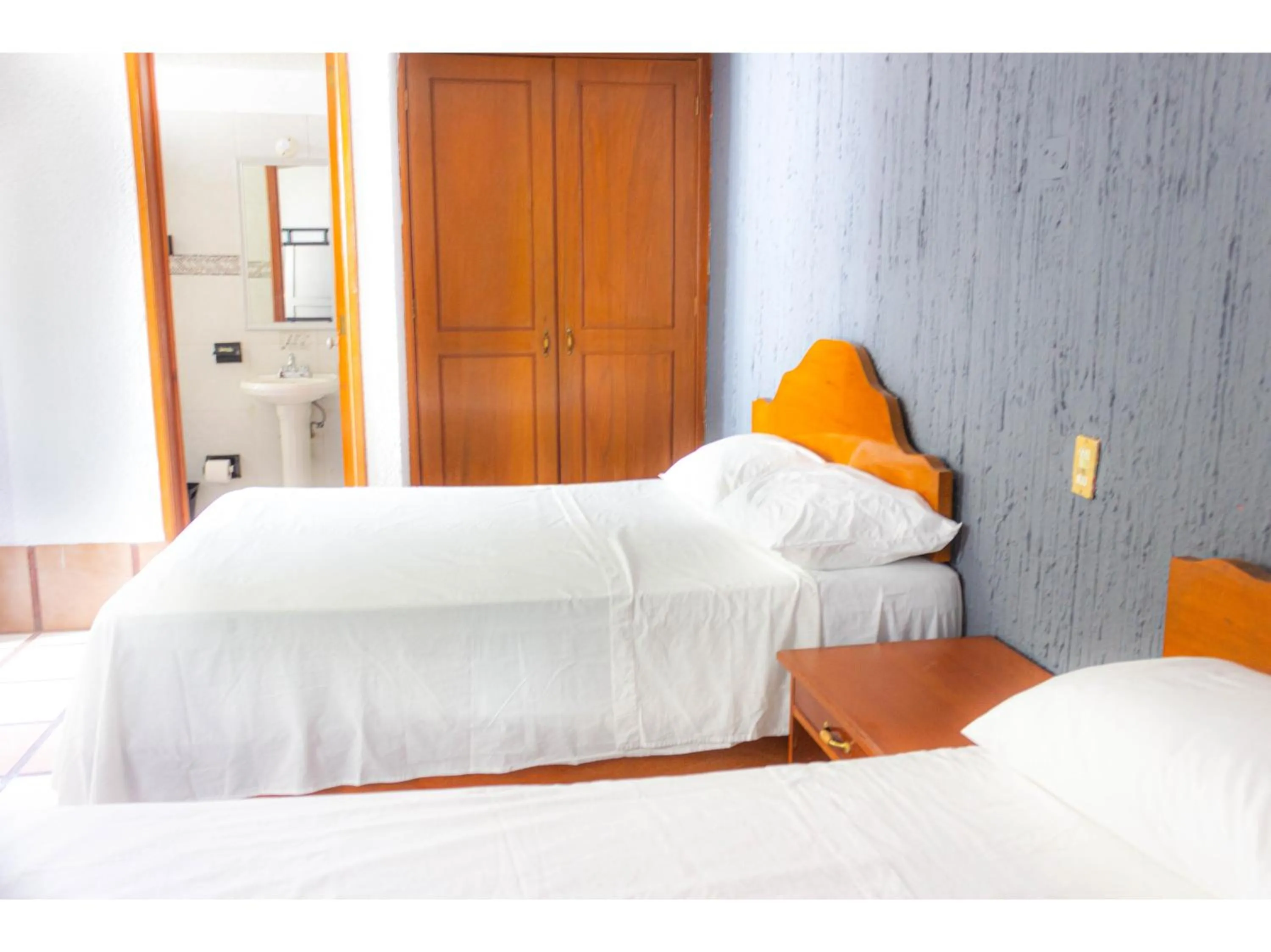 Bedroom in OYO Hotel San Felipe Inn