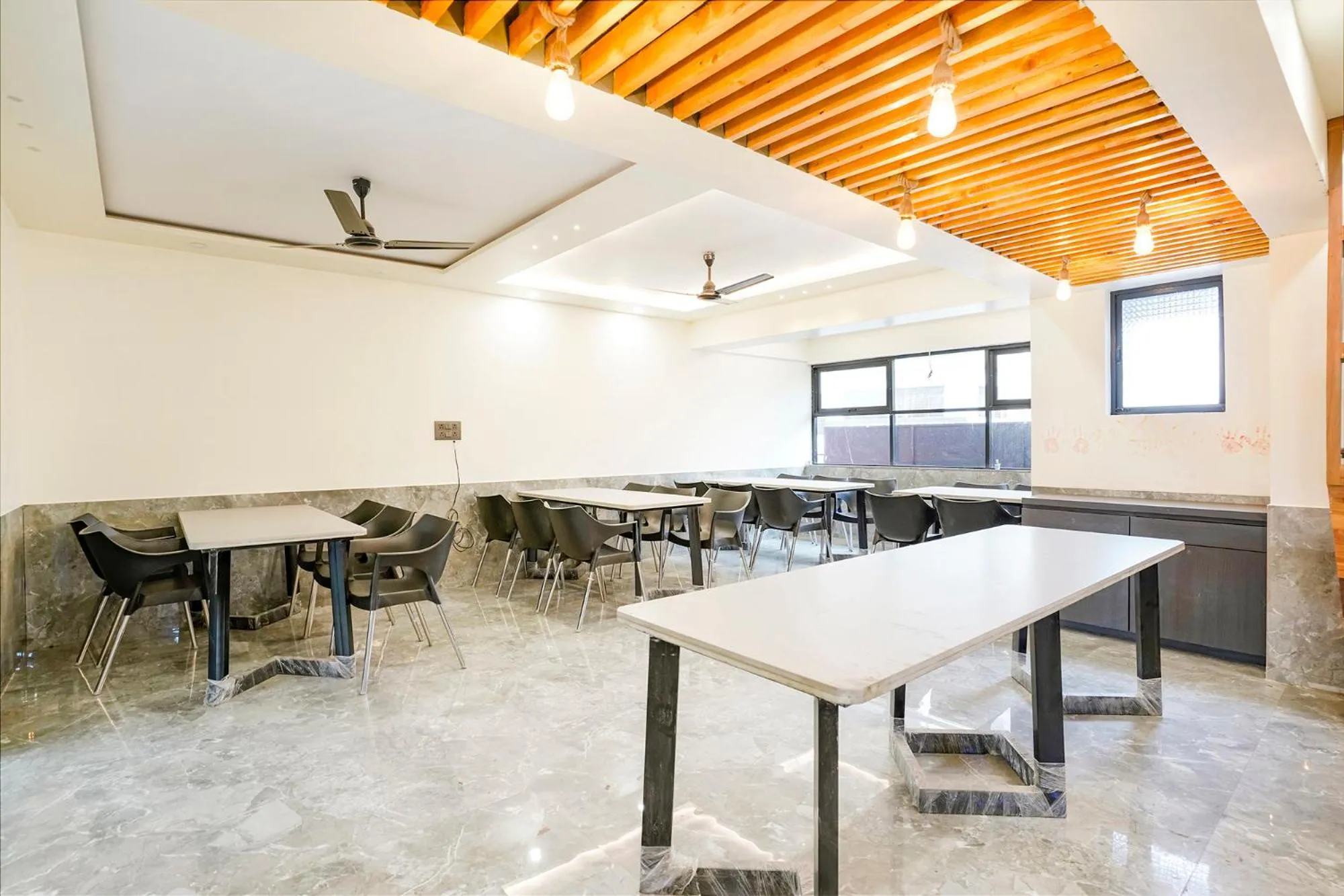 Dining area in FabHotel Prestige Elite - Nashik Road