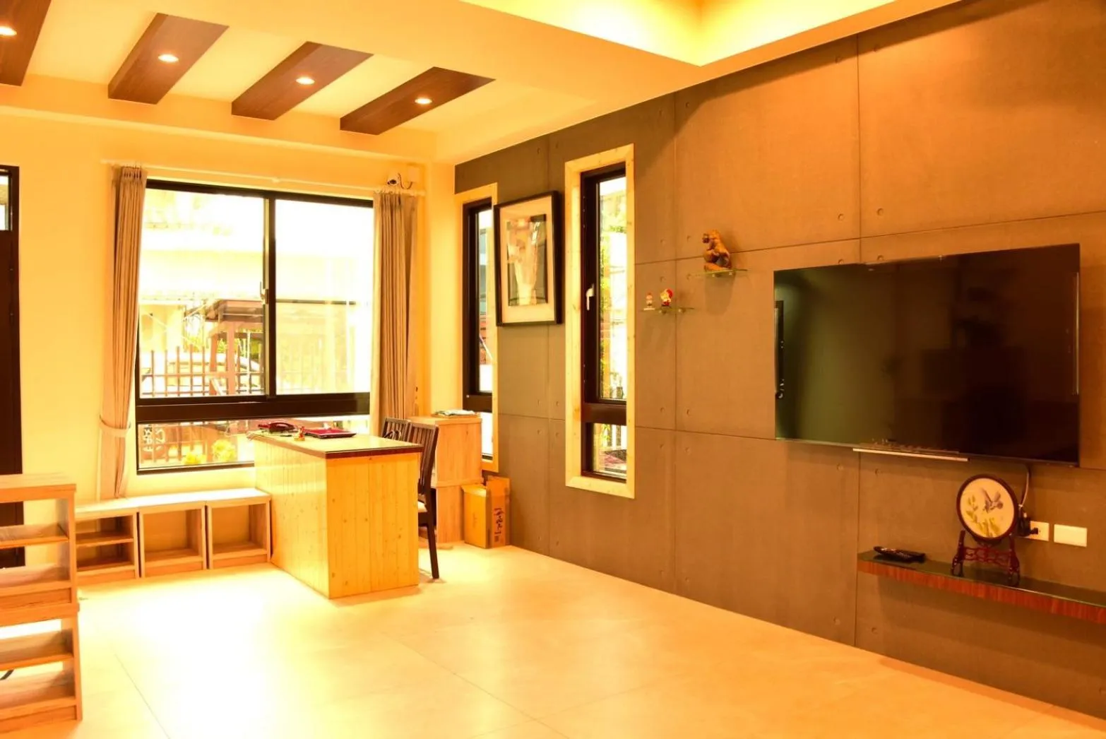 Communal lounge/ TV room in Shui Yifang B&B