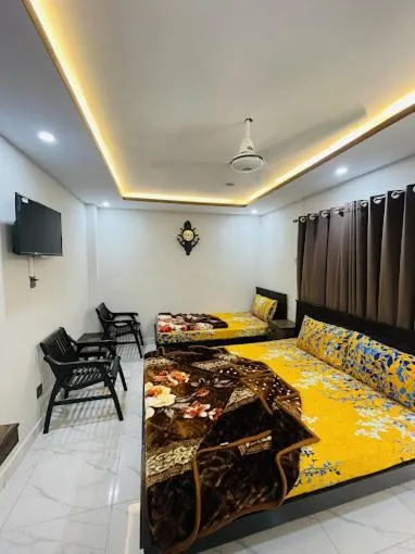 Bed in Moven Inn Hotel Islamabad