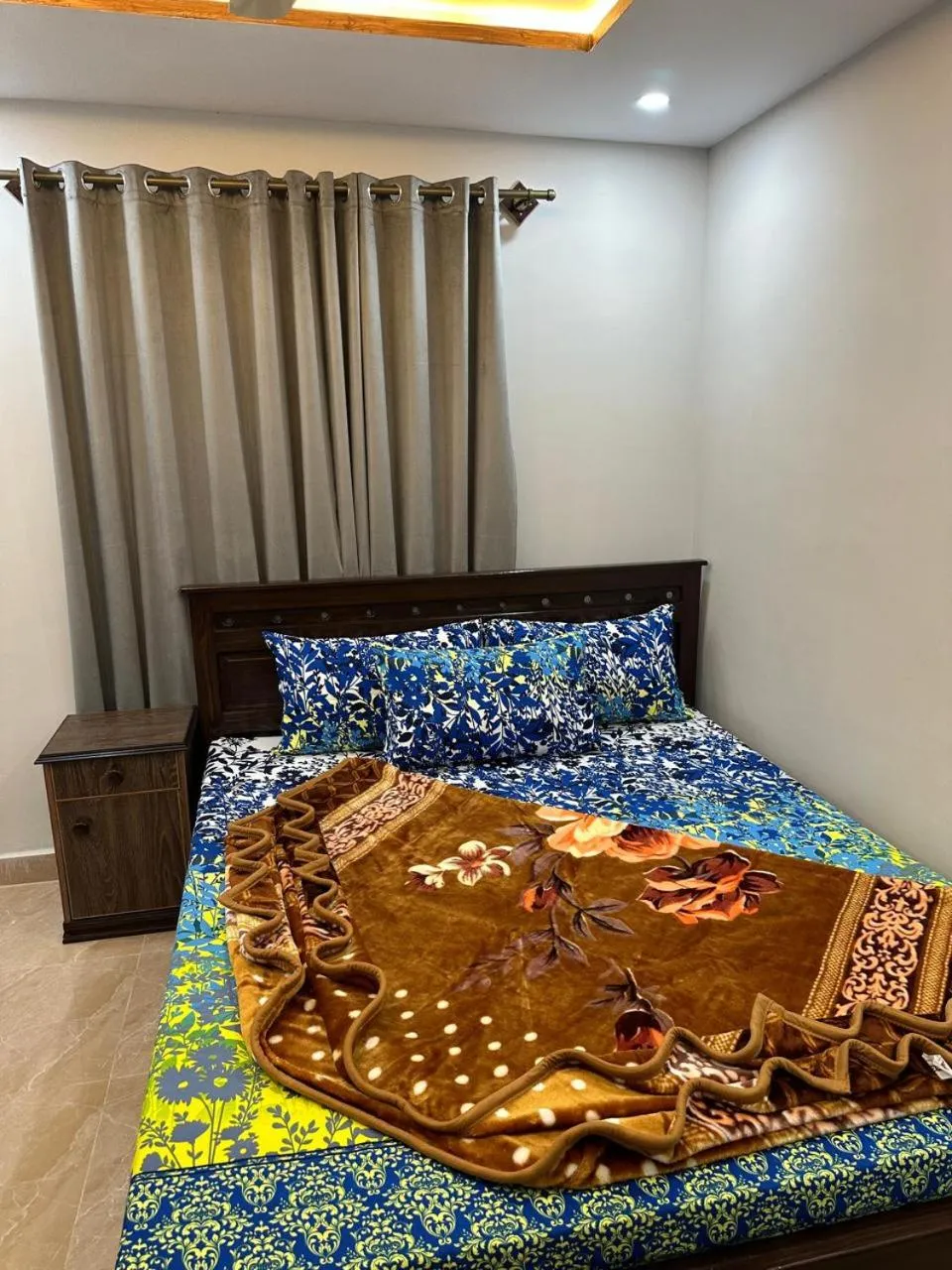 Bed in Moven Inn Hotel Islamabad