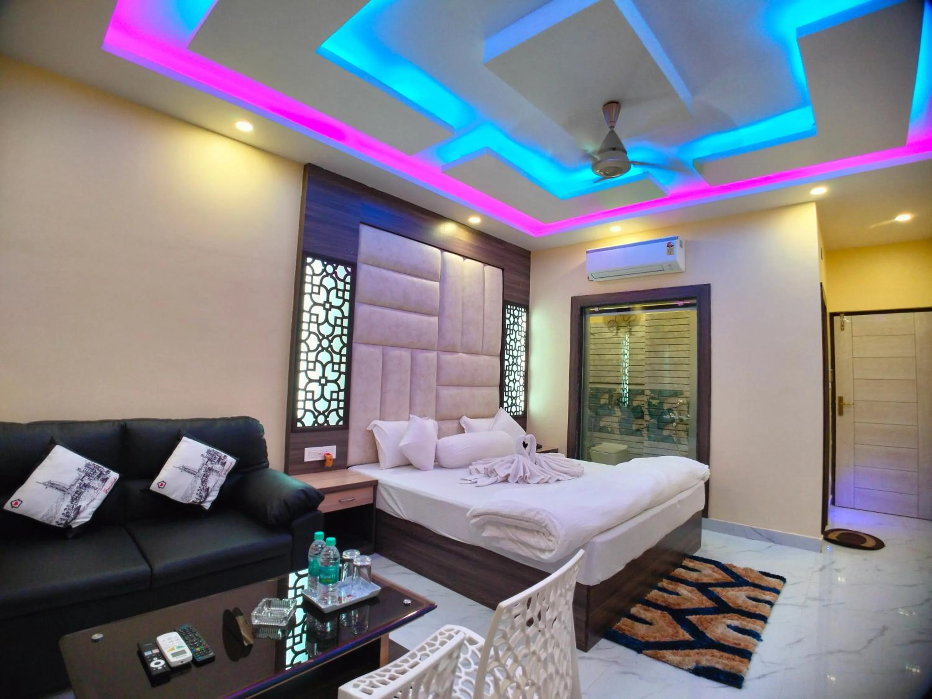 Bed in The Triton Beach Resort