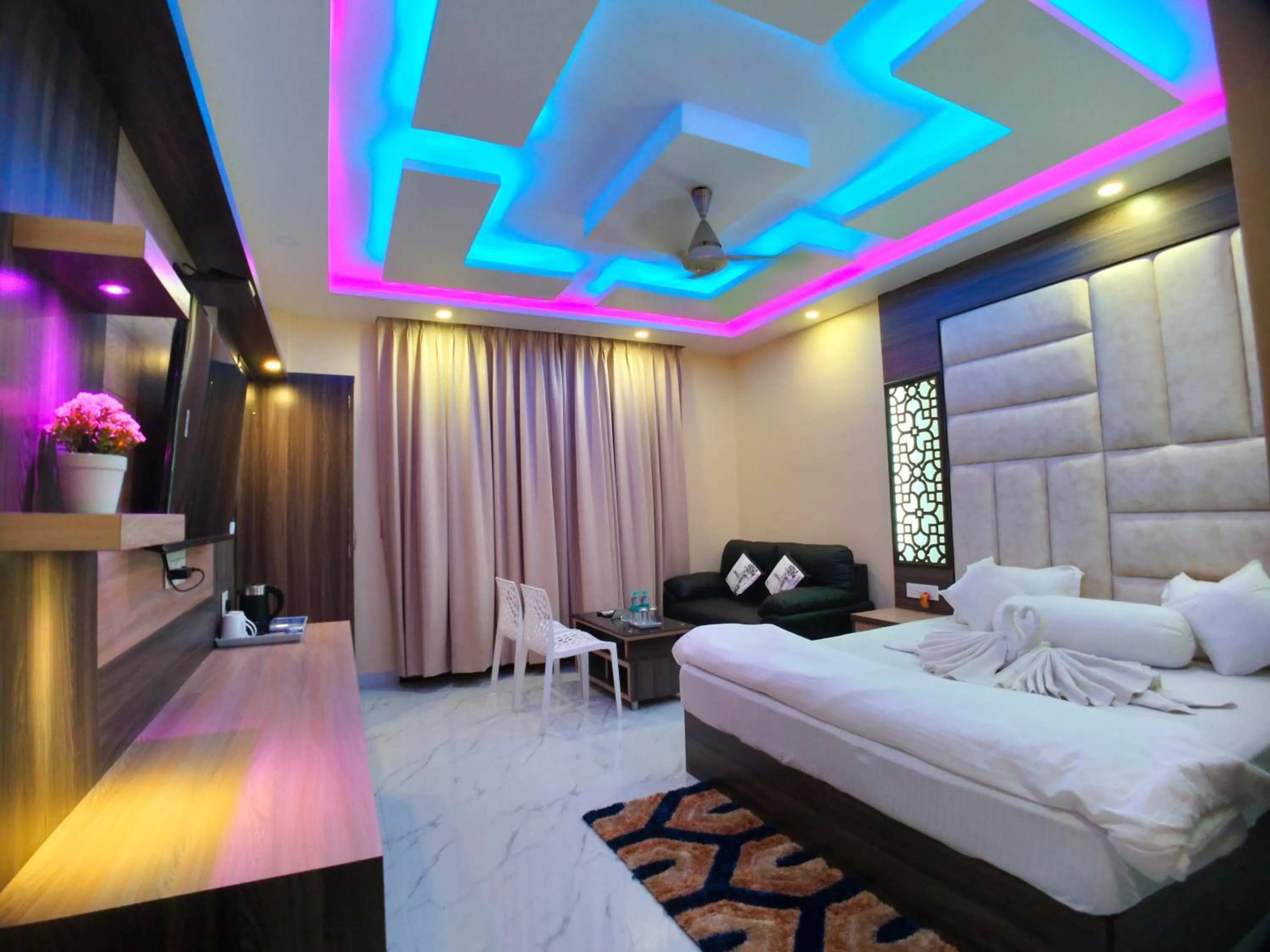 Bed in The Triton Beach Resort