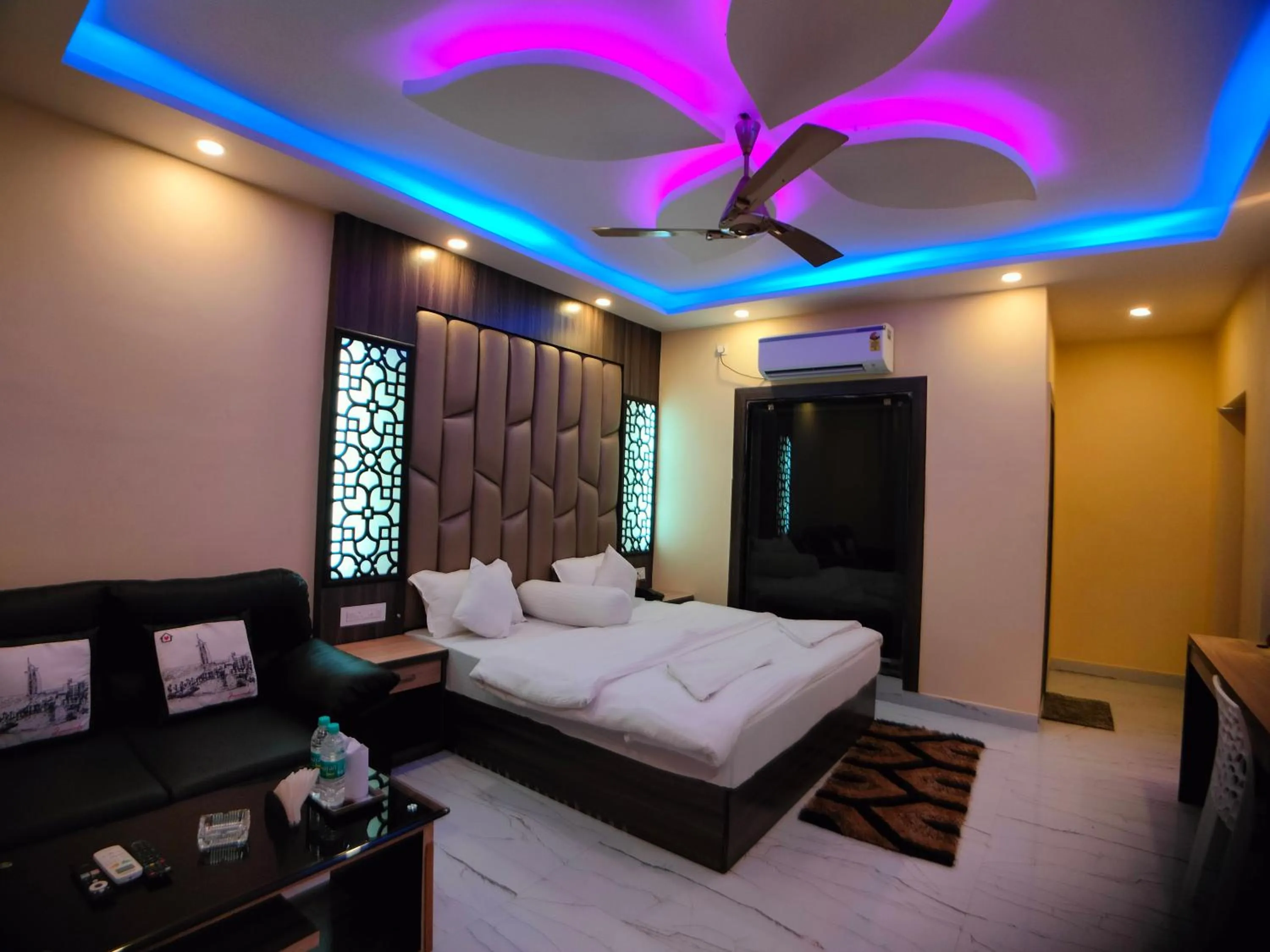 Bed in The Triton Beach Resort