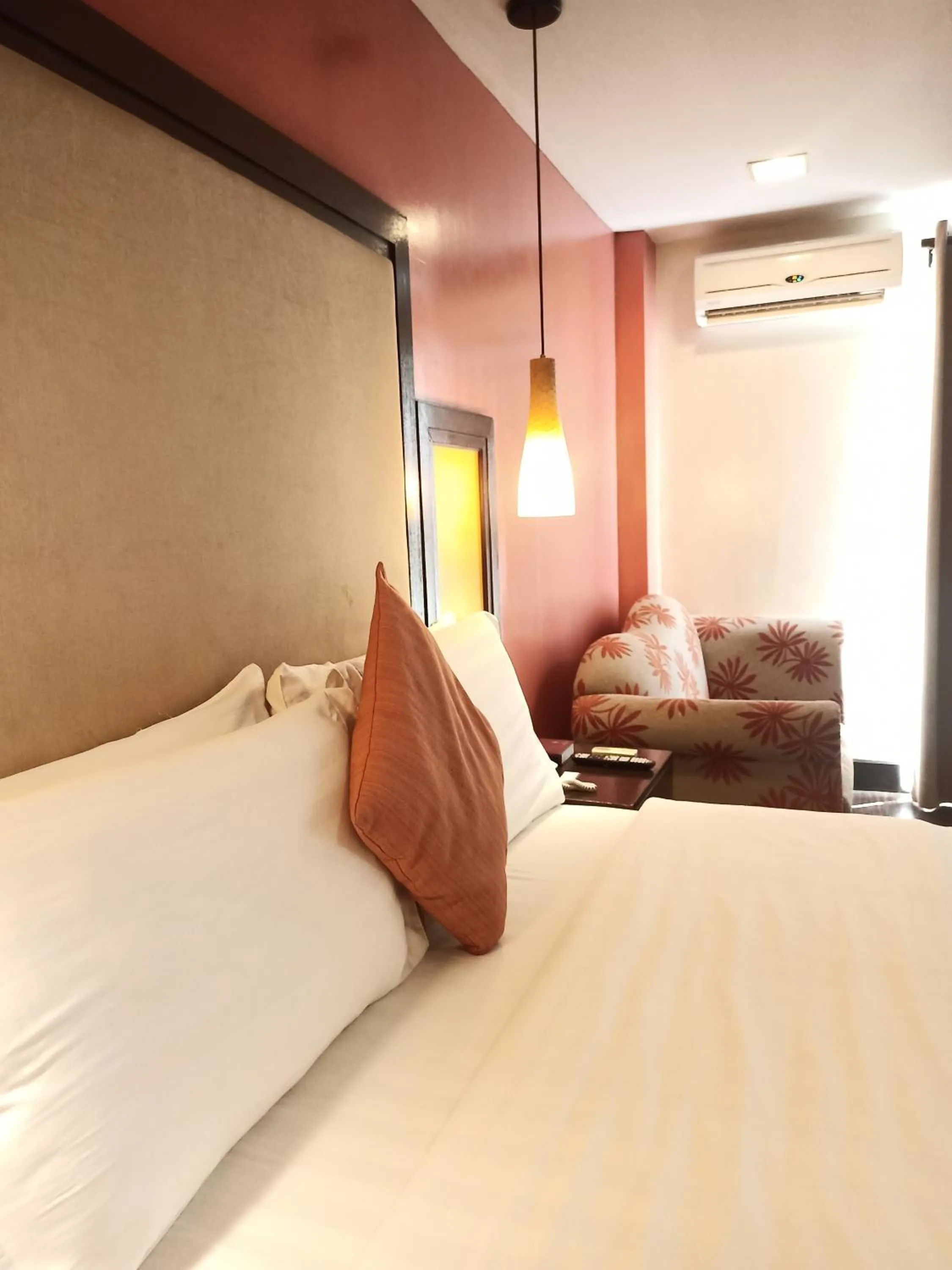 Bed in Coron Gateway Hotel & Suites