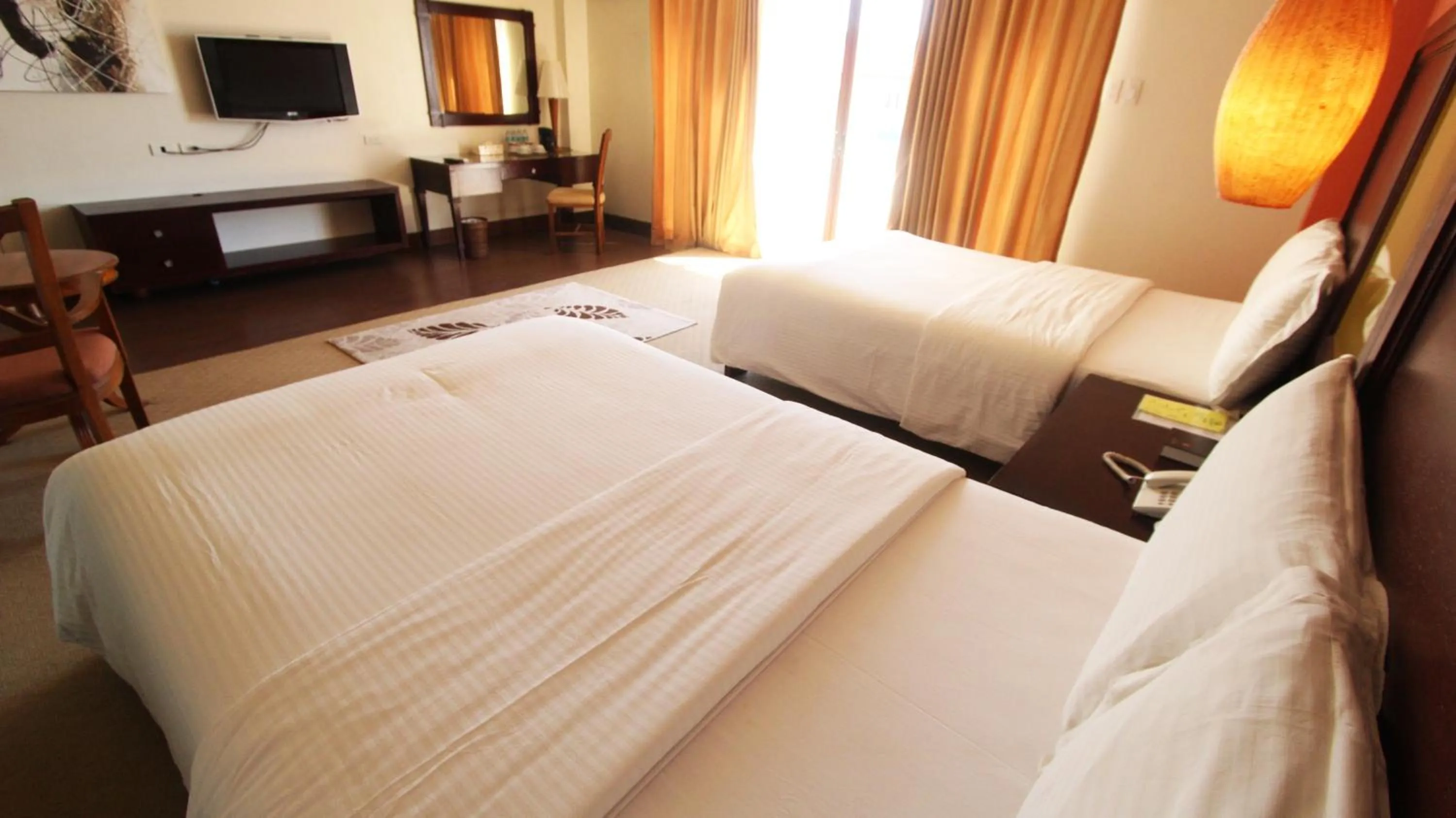 Bed in Coron Gateway Hotel & Suites