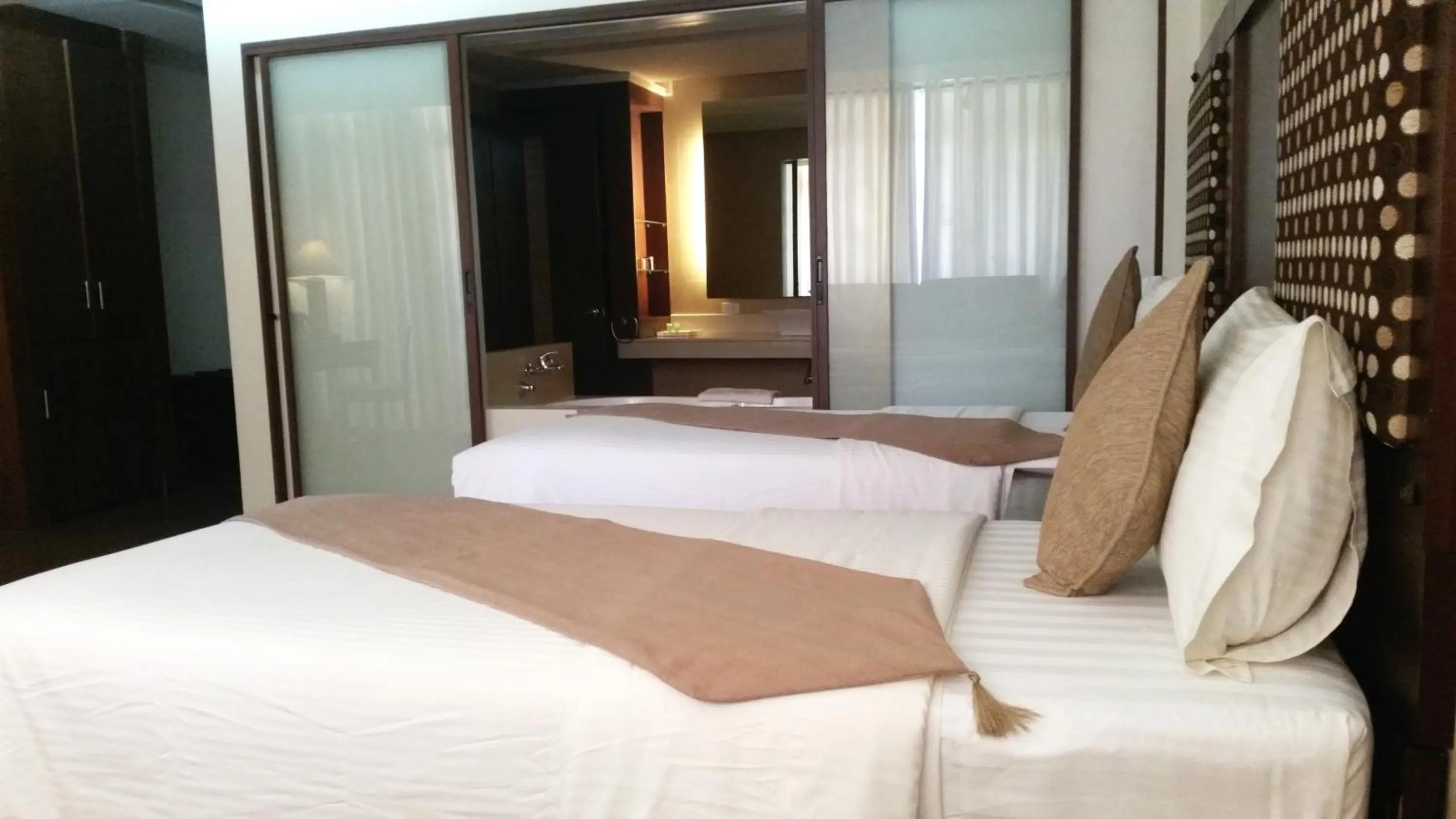 Bed in Coron Gateway Hotel & Suites