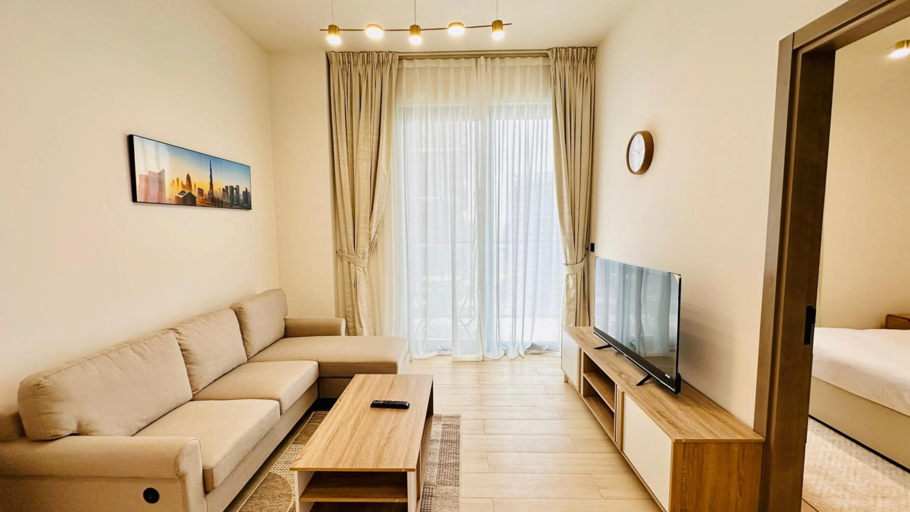 Living room in OYO 1291 Home Fully Furnished 1bed Apt @JVC