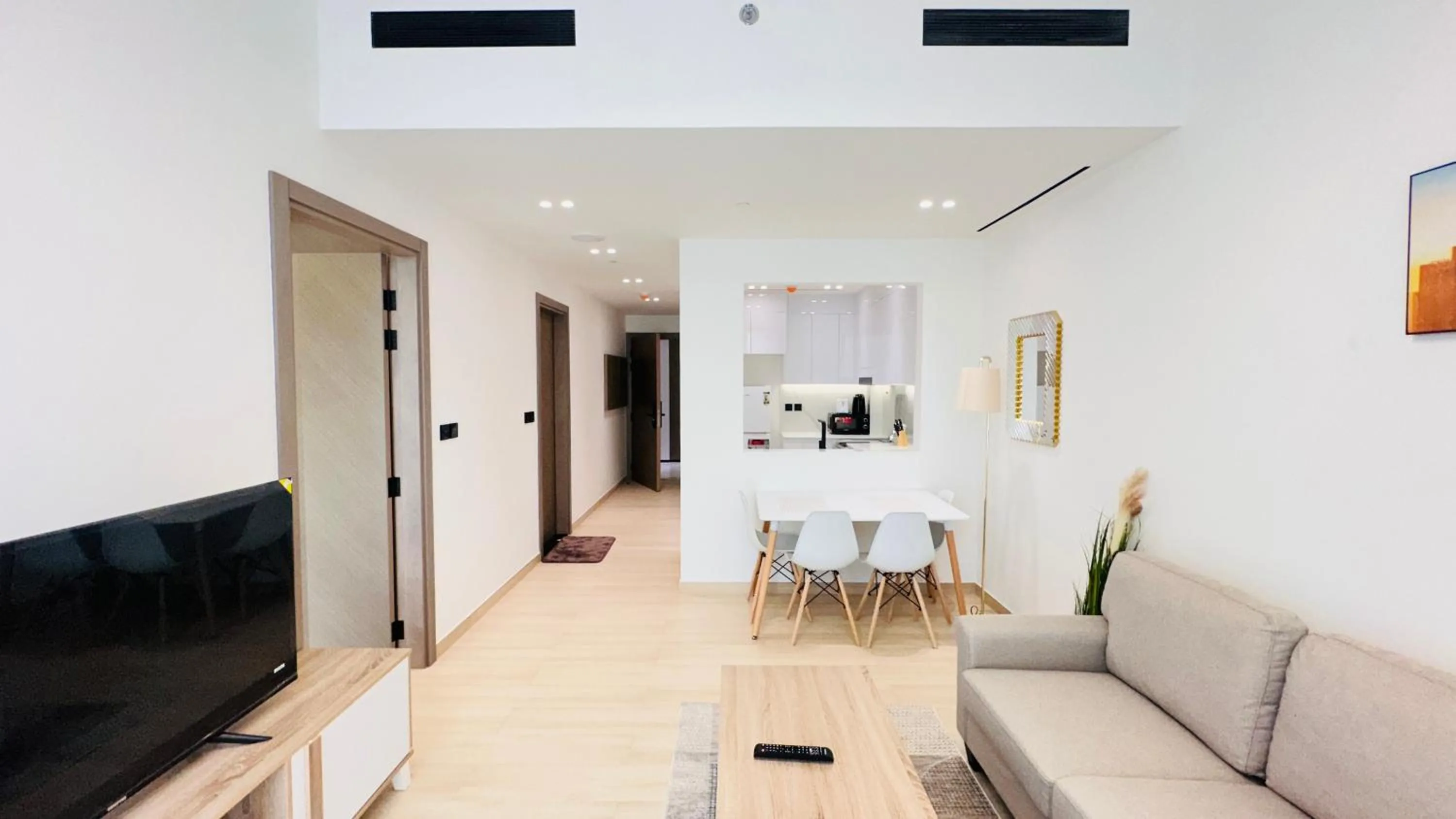 Living room in OYO 1291 Home Fully Furnished 1bed Apt @JVC