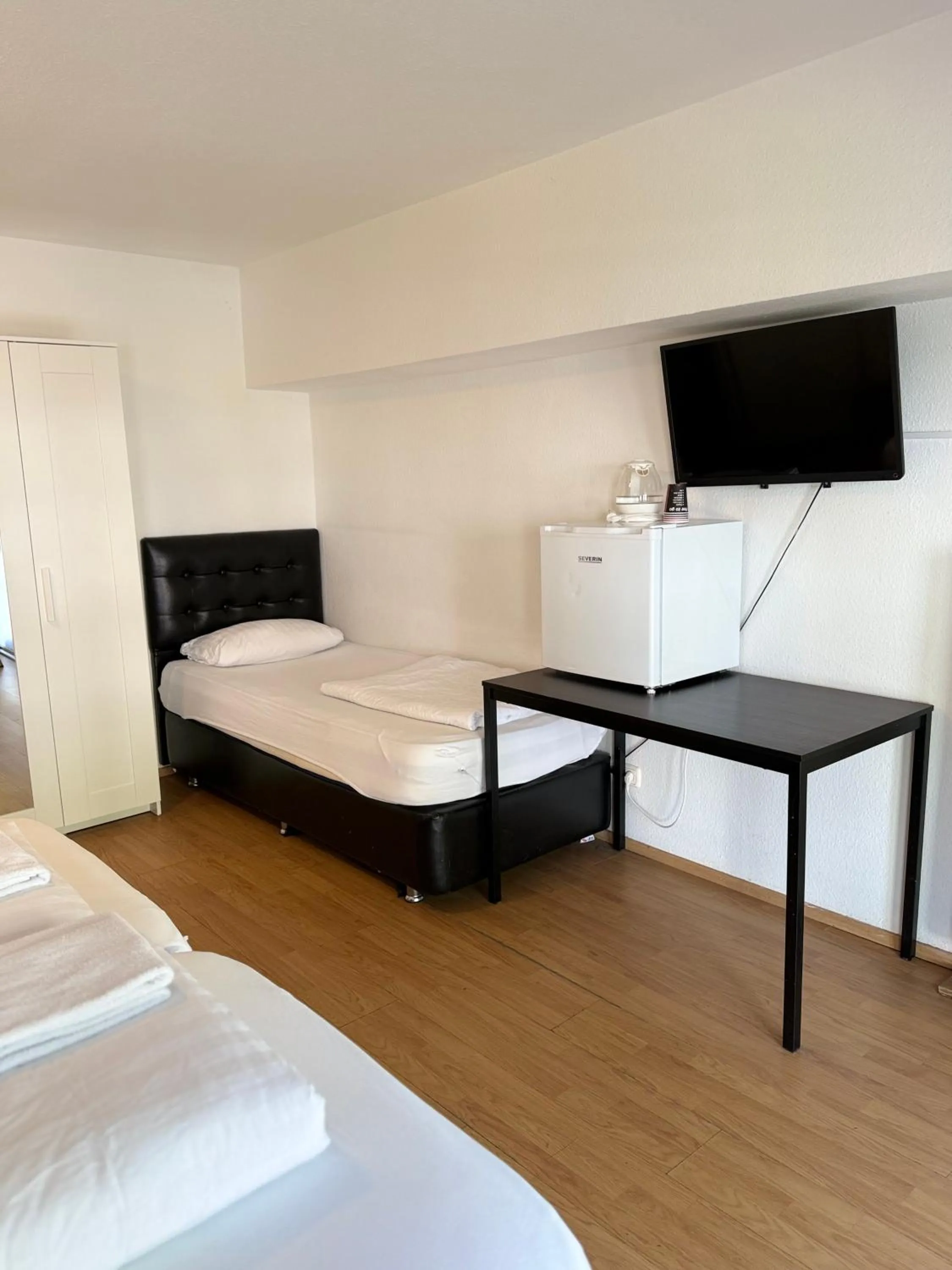 Bed in Hotel Garni Emir