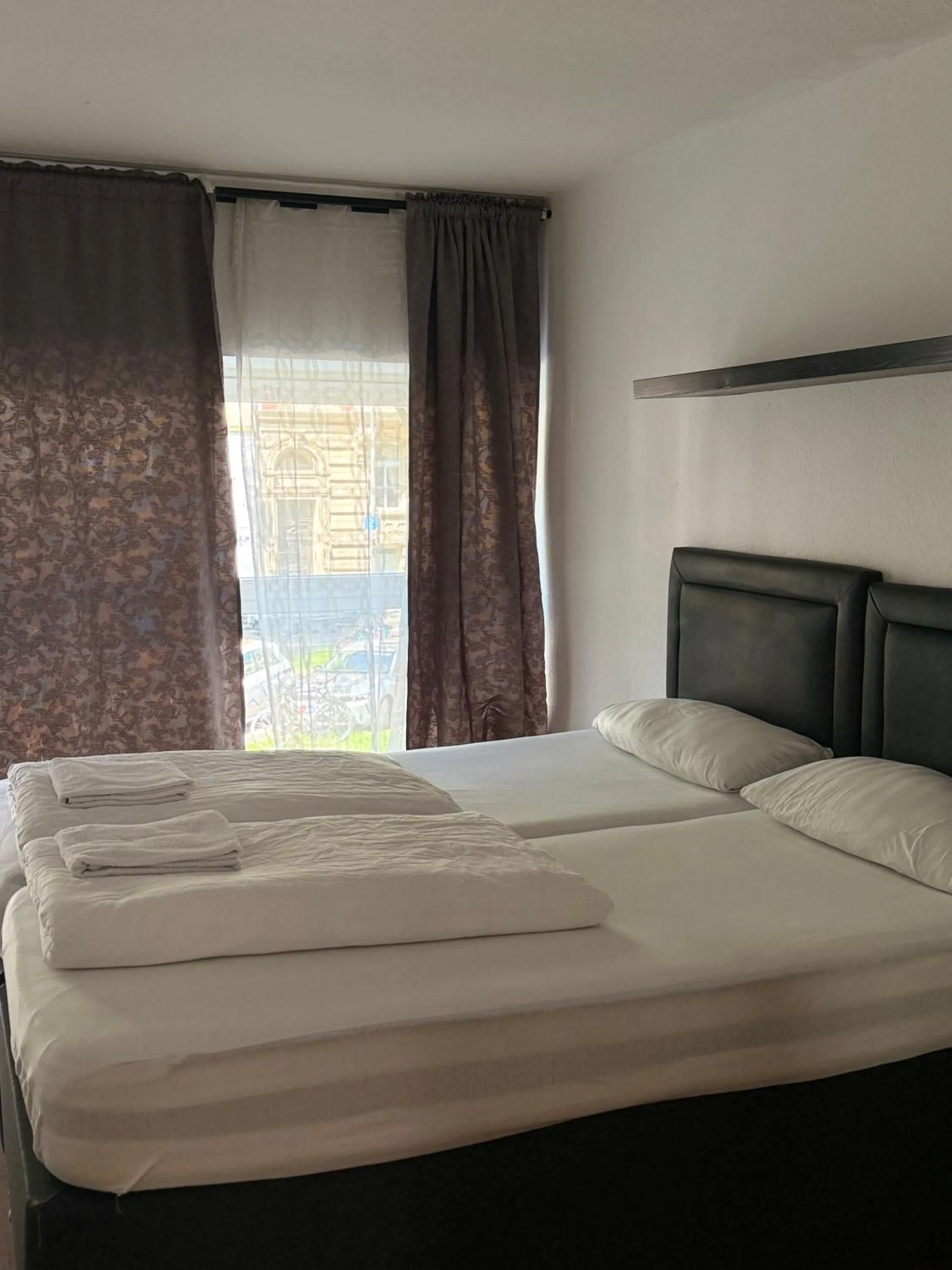 Bed in Hotel Garni Emir