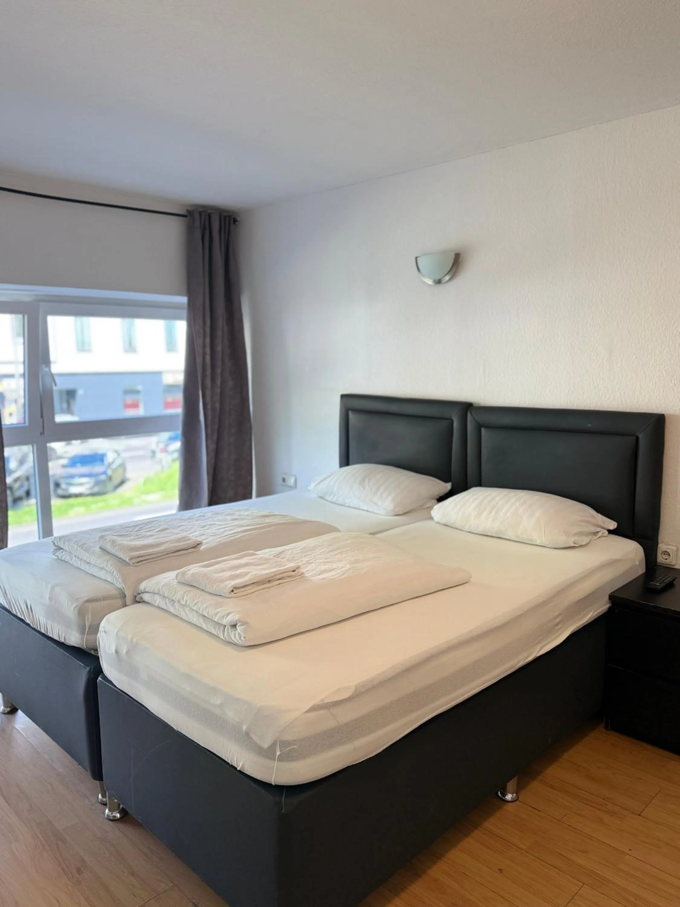 Bed in Hotel Garni Emir