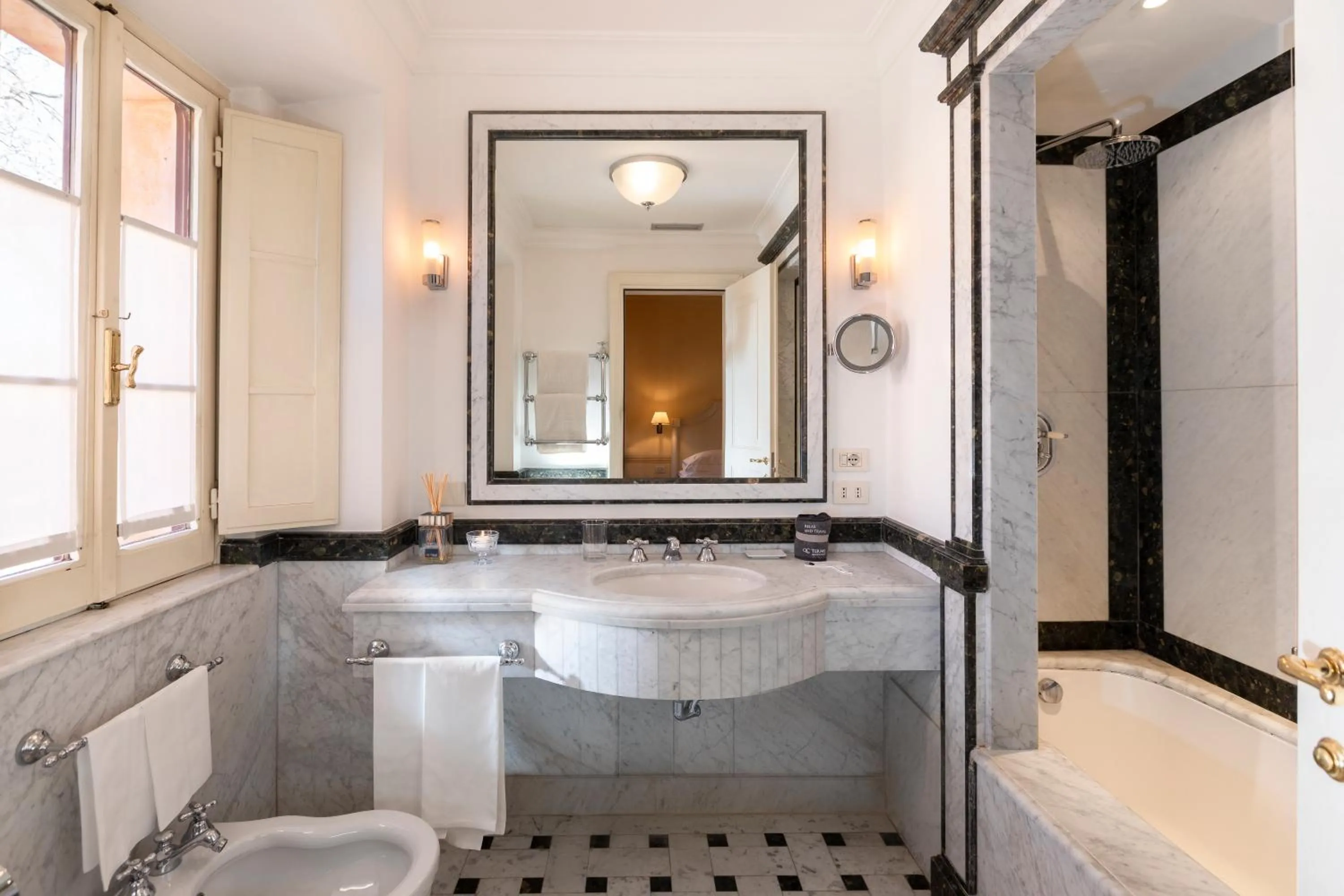 Bathroom in QC Grand Hotel Roma