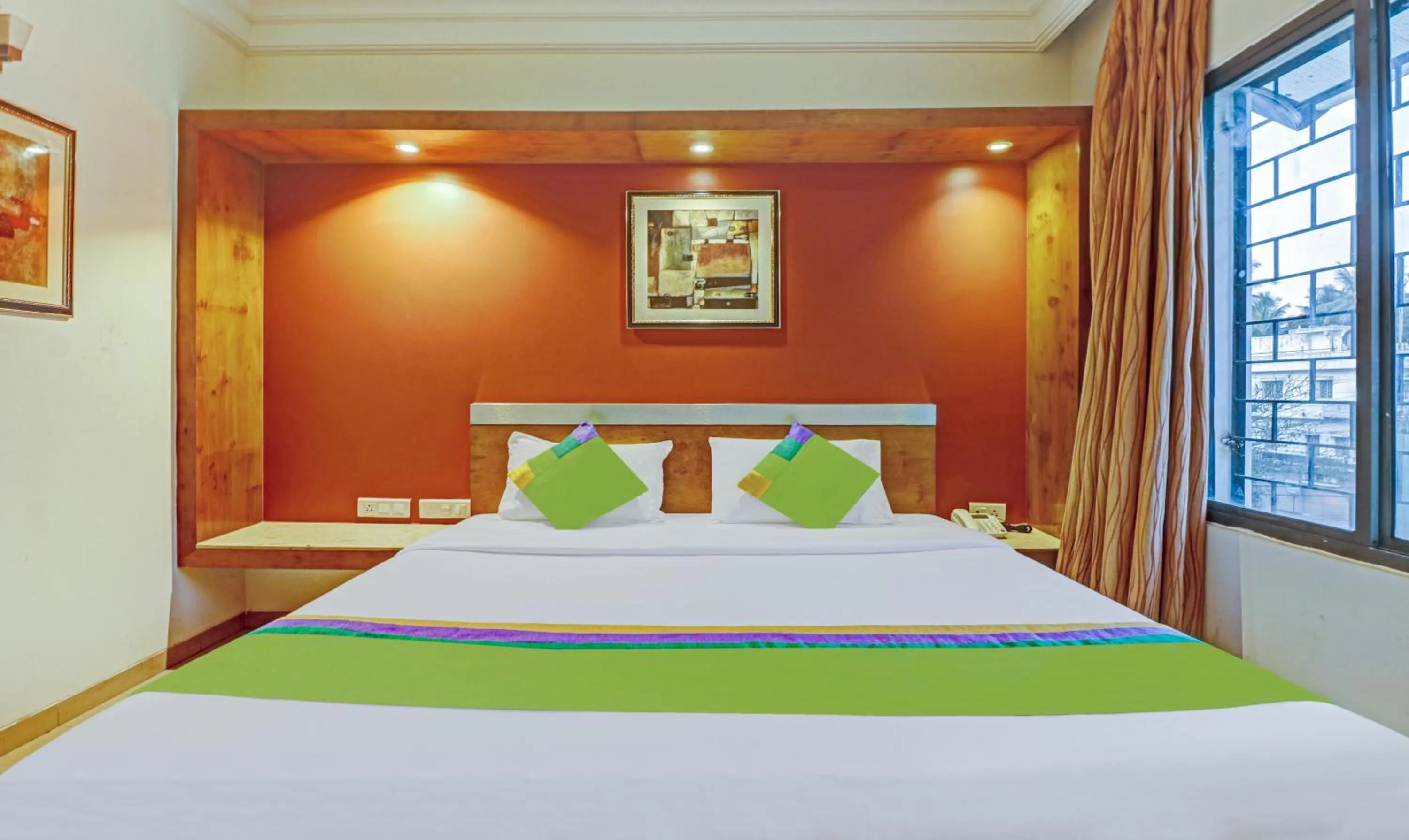 Bedroom, Bed in Treebo Suraksha Inn