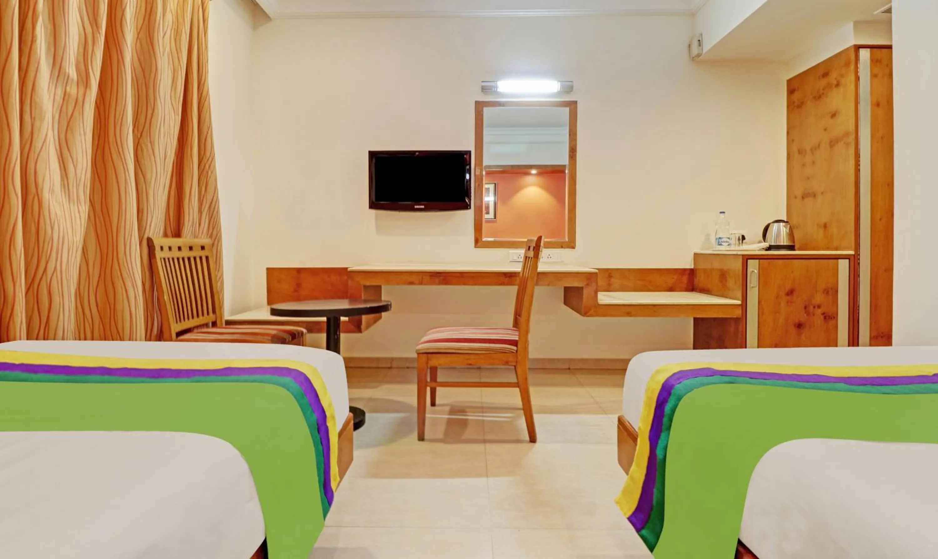 Bedroom, Bed in Treebo Suraksha Inn