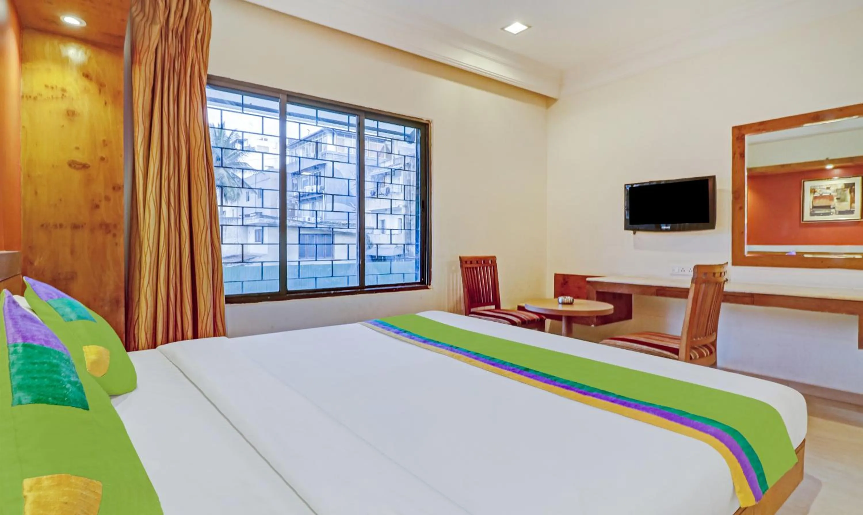 Bedroom, Bed in Treebo Suraksha Inn