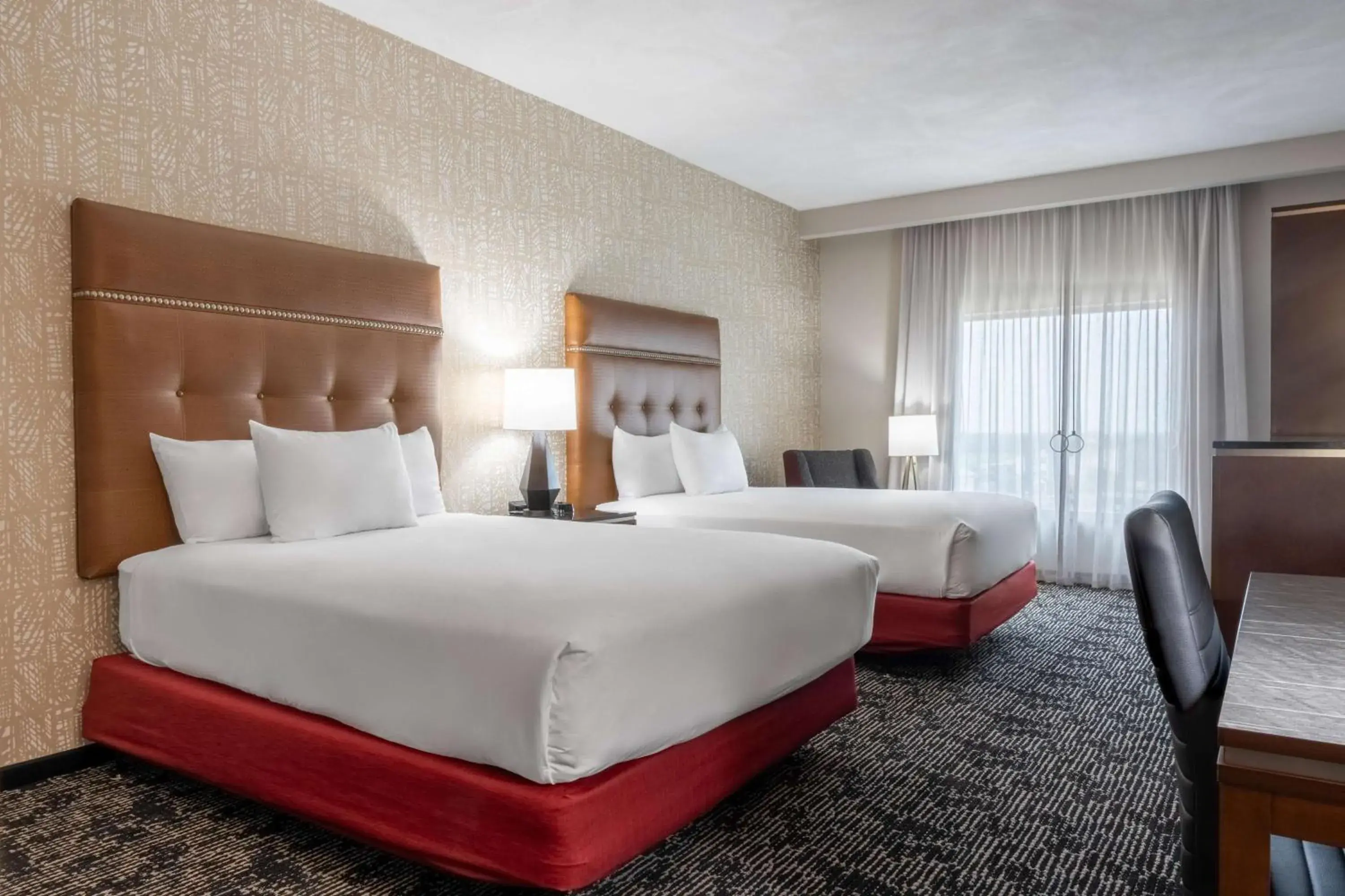 Upper Floor Deluxe Room with Two Queen Beds - Hearing Accessible, Roll-In Shower in Drury Plaza Hotel College Station Upper Floor Deluxe Room with Two Queen Beds - Hearing Accessible, Roll-In Shower in Drury Plaza Hotel College Station