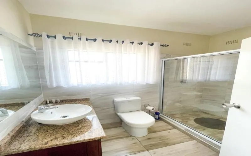 Shower in Pemabwe Guest Lodge