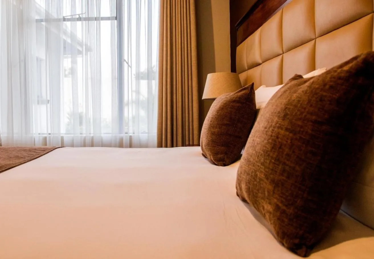 Bed in Pemabwe Guest Lodge