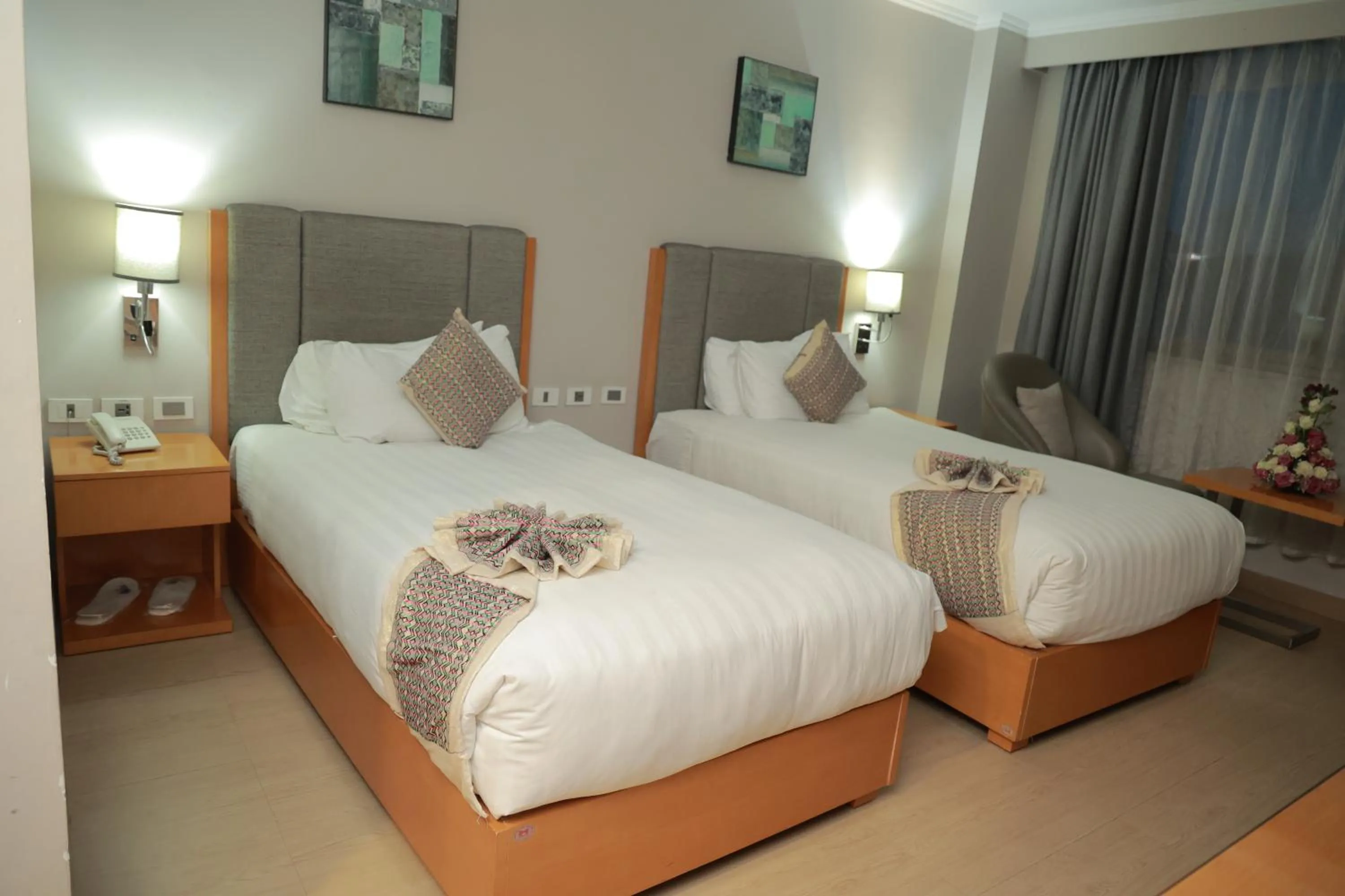 Bed in Ambassador Hotel