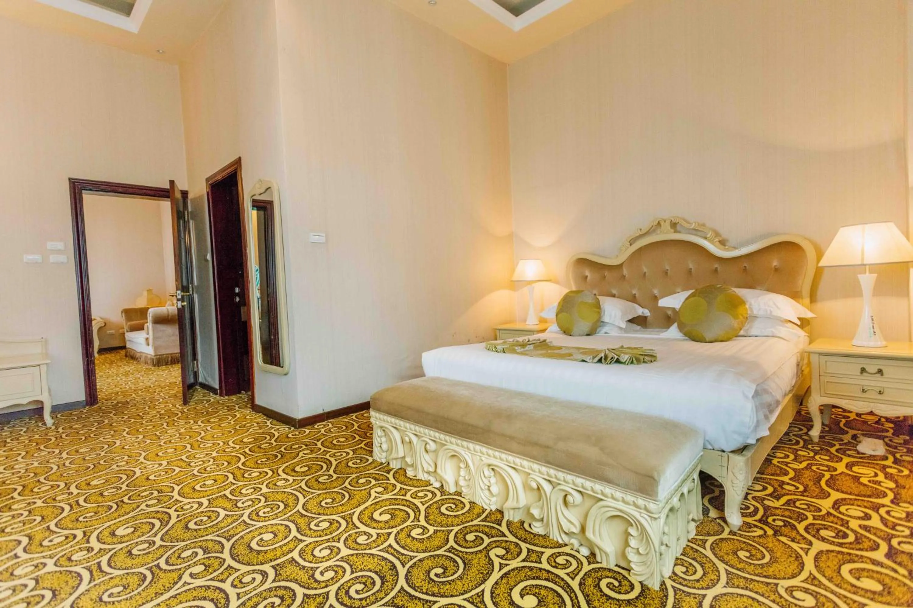 Bed in Ambassador Hotel