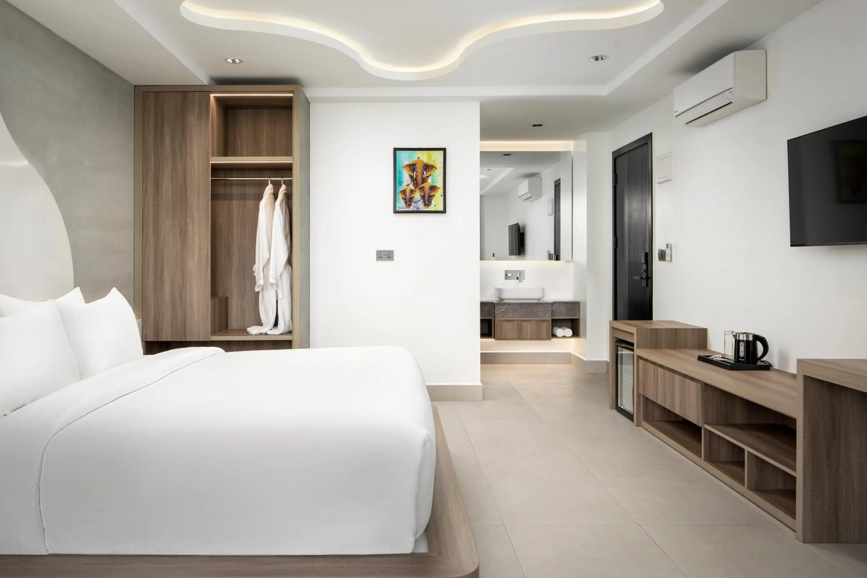 Bed in Chaiya Palace Hotel