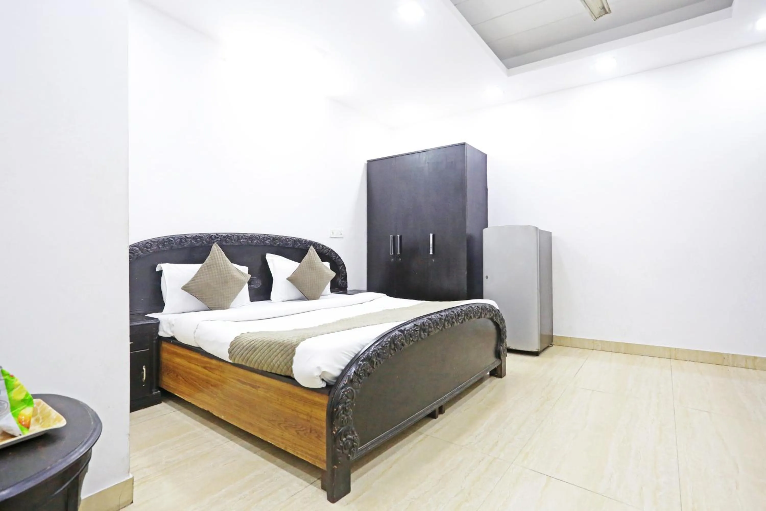 Bed in Mauryan Elite Hotel Lajpat Nager