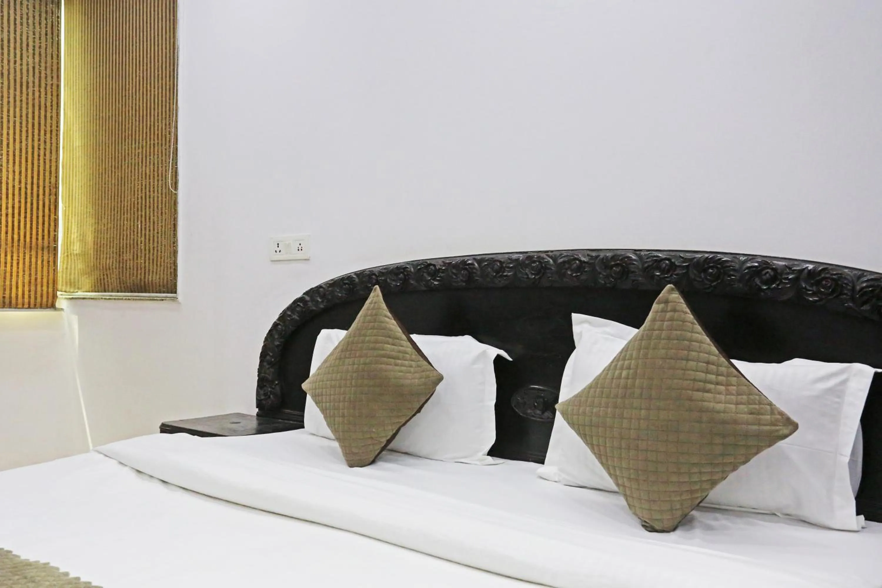 Bed in Mauryan Elite Hotel Lajpat Nager