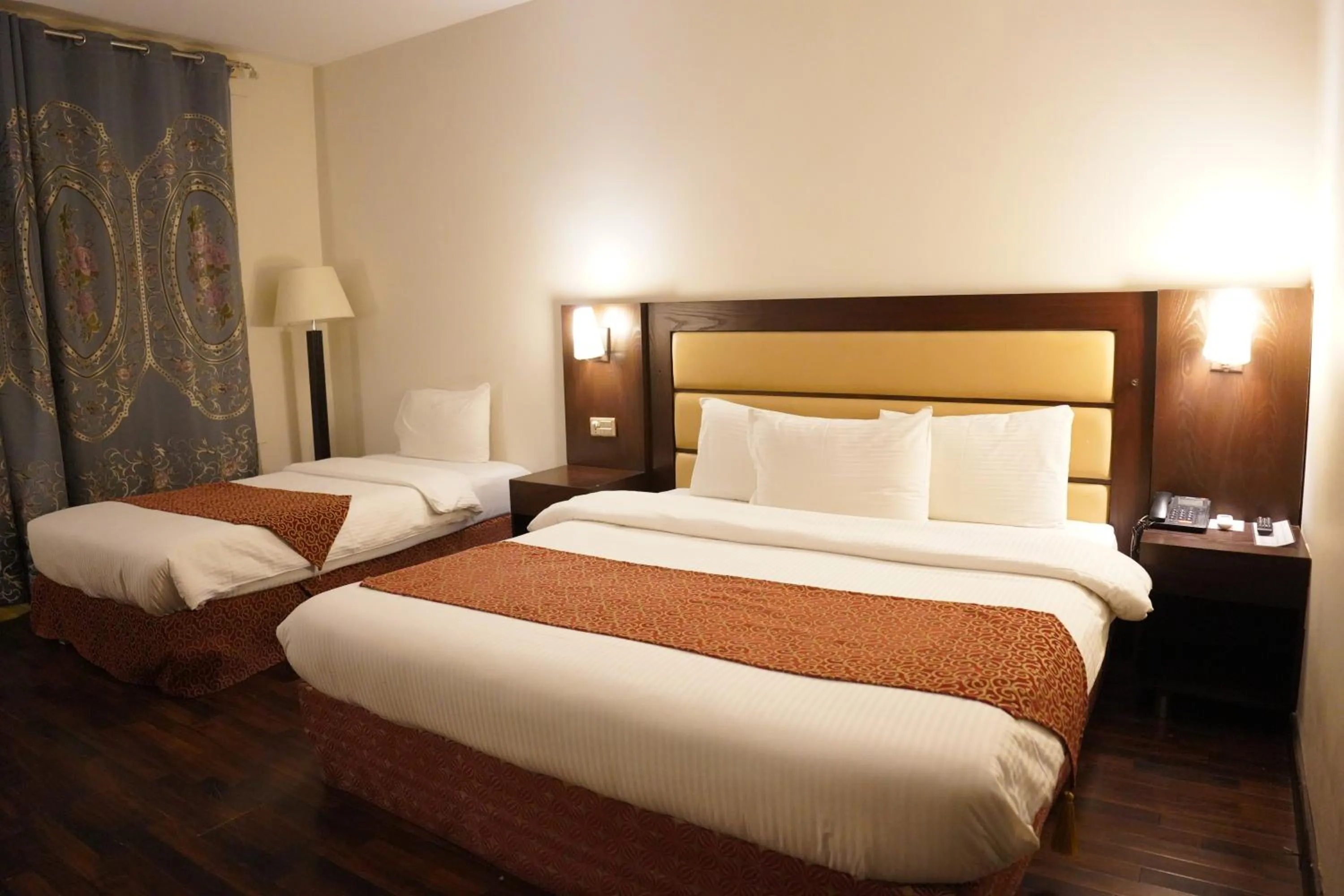 Bed in Hunza Darbar Hotel