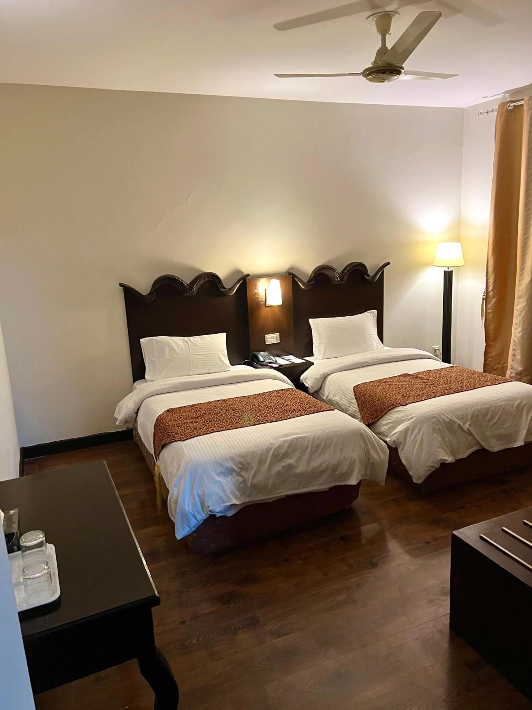 Bed in Hunza Darbar Hotel