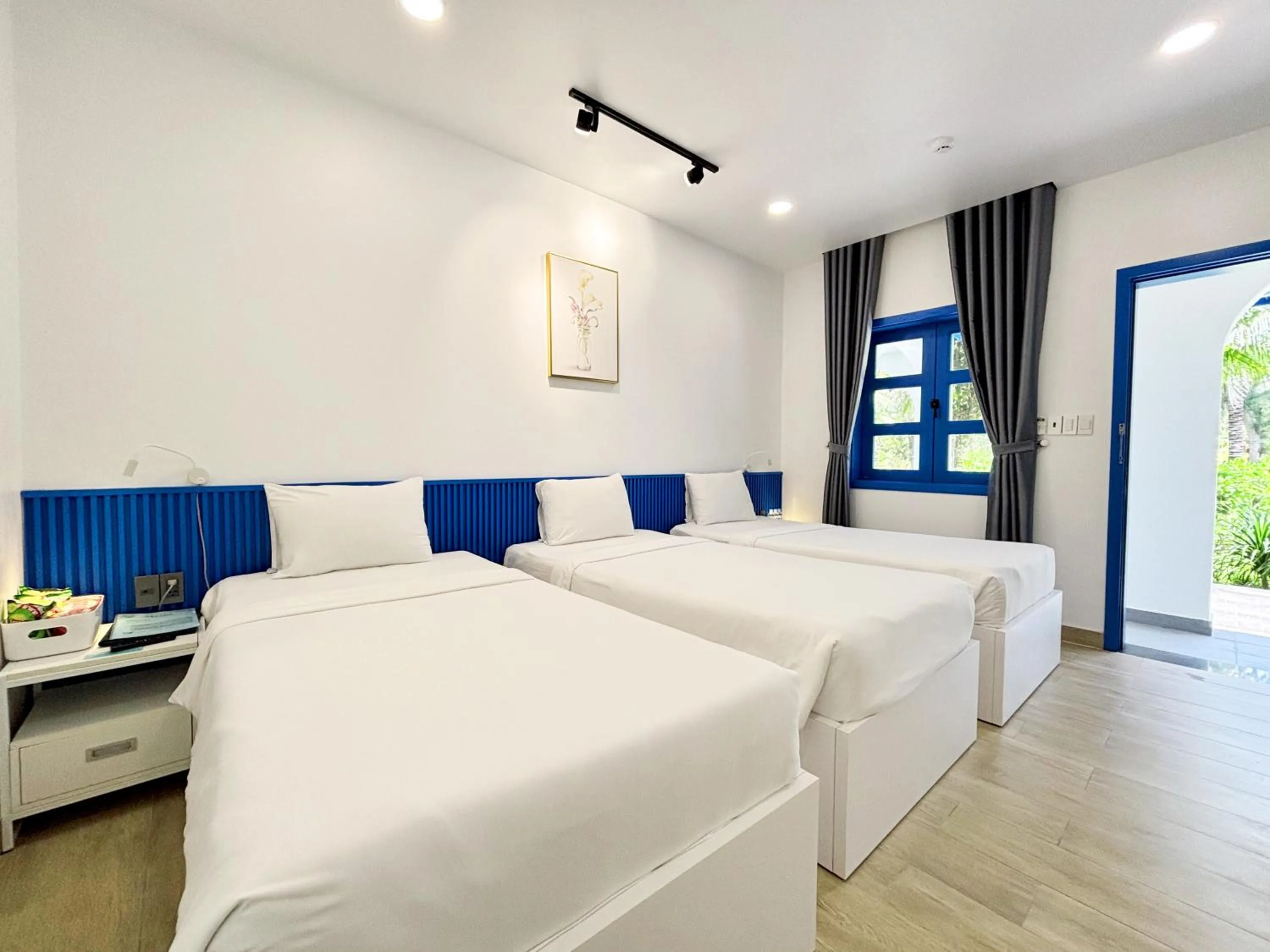 Bed in KIGI Beach Resort