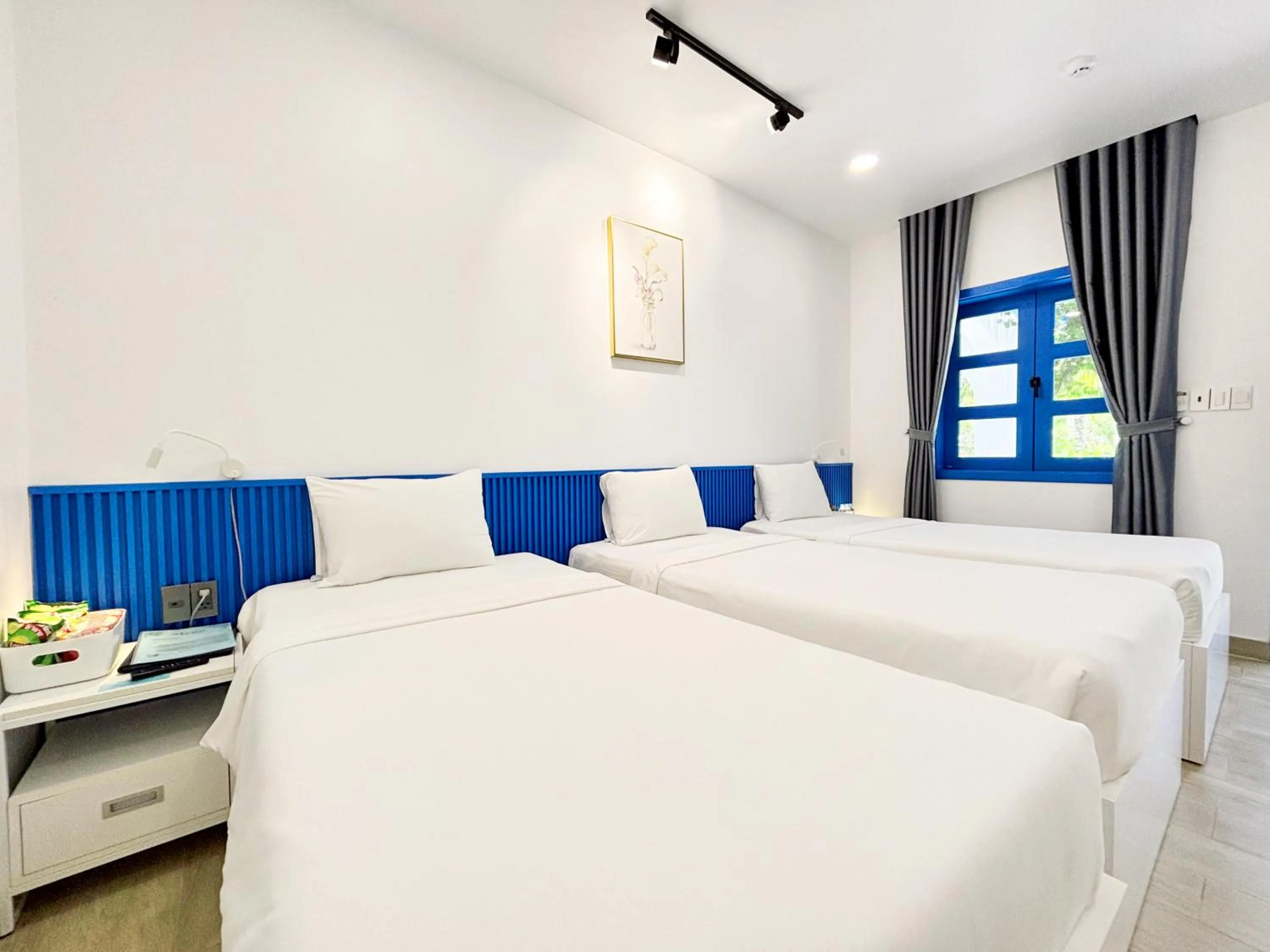 Bed in KIGI Beach Resort